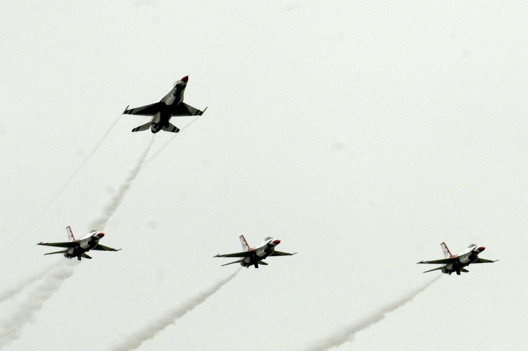 The U.S. Air Force Air Demonstration Squadron, the Thunderbirds, perform aerial demonstrations during the AirPower over Hampton Roads open house at Langley Air Force Base, Va., May 13, 2011. The open house gives military and civilian personnel the opportunity to look various aircraft used by the military that they would not otherwise have the chance to experience. (U.S. Air Force photo by Staff Sgt. Jeff Nevison)(RELEASED)