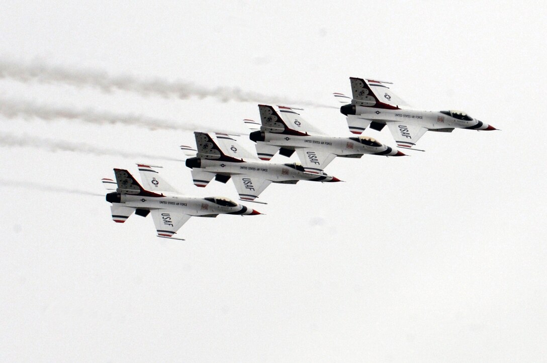 The U.S. Air Force Air Demonstration Squadron, the Thunderbirds, perform aerial demonstrations during the  AirPower over Hampton Roads open house at Langley Air Force Base, Va., May 13, 2011. The open house educates the public about Air Force capabilities and shows appreciation to the local community. (U.S. Air Force photo by Staff Sgt. Jeff Nevison)(RELEASED)