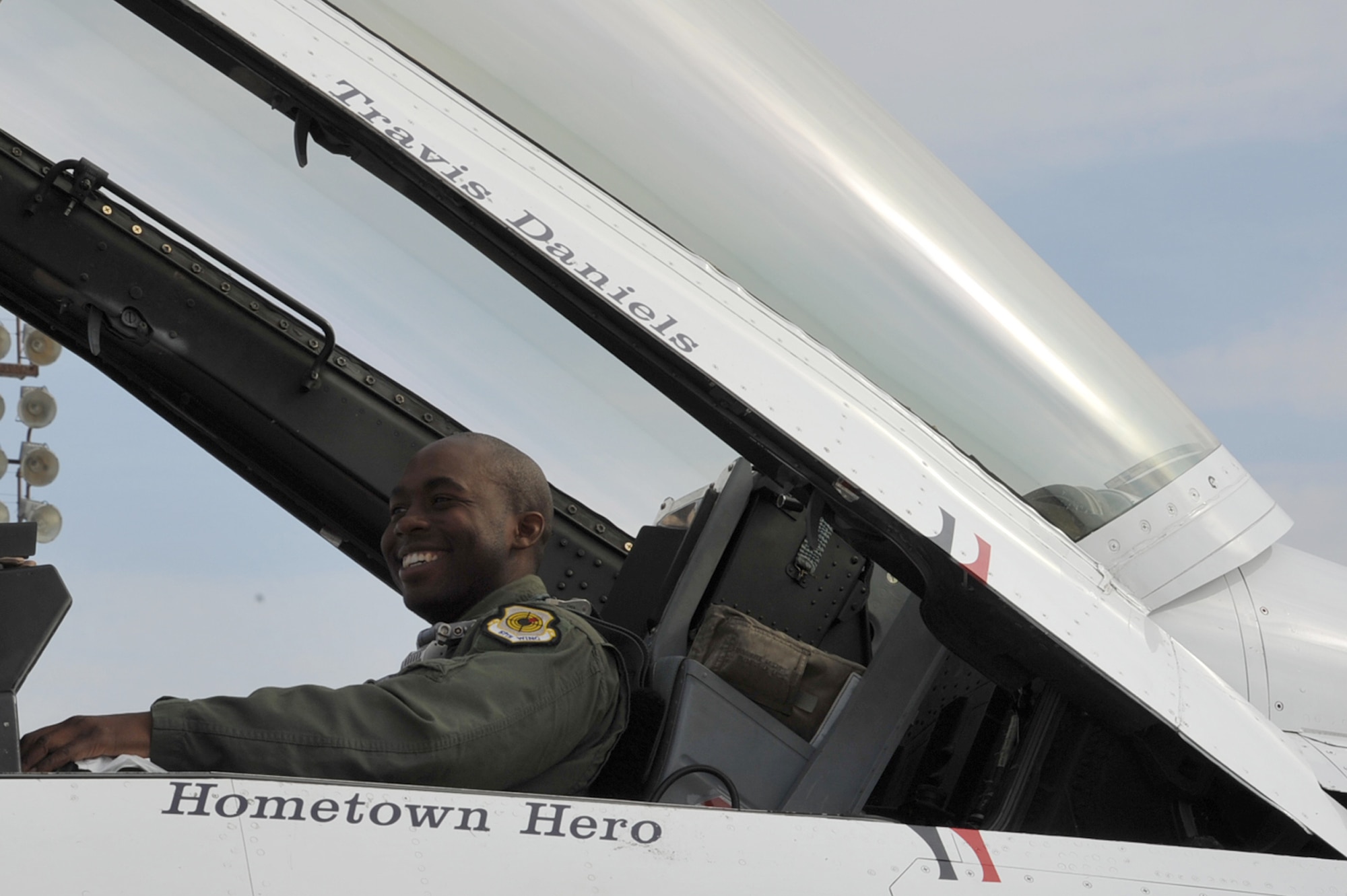 Travis Daniels, emergency medical technician, sits in the cockpit of a F-16 Fighting Falcon at Langley Air Force Base, Va., May 12, 2011. The Thunderbirds selected Mr. Daniels as the AirPower over Hampton Roads Hometown Hero, for which they rewarded him with an orientation flight in an F-16 Fighting Falcon. (U.S. Air Force photo by Airman 1st Class Camilla Griffin)(RELEASED)