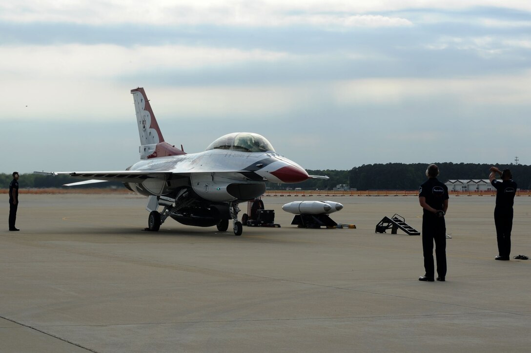 The U.S. Air Force Demonstration Squadron, the Thunderbirds, crew members ready the pilot for departure from Langley Air Force Base, Va., May 12, 2011. The Thunderbirds selected Travis Daniels as the AirPower over Hampton Roads Hometown Hero, for which they rewarded him with an orientation flight in an F-16 Fighting Falcon. (U.S. Air Force photo by Airman 1st Class Racheal Watson)(RELEASED)