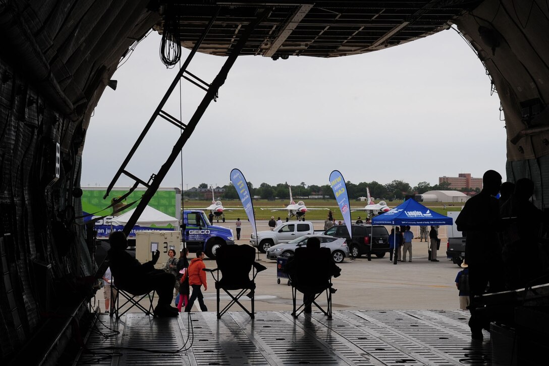 Spectators watch a demonstration from inside a C-5 Galaxy aircraft during the AirPower over Hampton Roads open house at Langley Air Force Base, Va., May 13, 2011. The open house gives all military and civilians the rare opportunity to get up-close-and-personal with various aircraft used by the military personnel. (U.S. Air Force photo by Staff Sgt. Ashley Hawkins)(RELEASED)