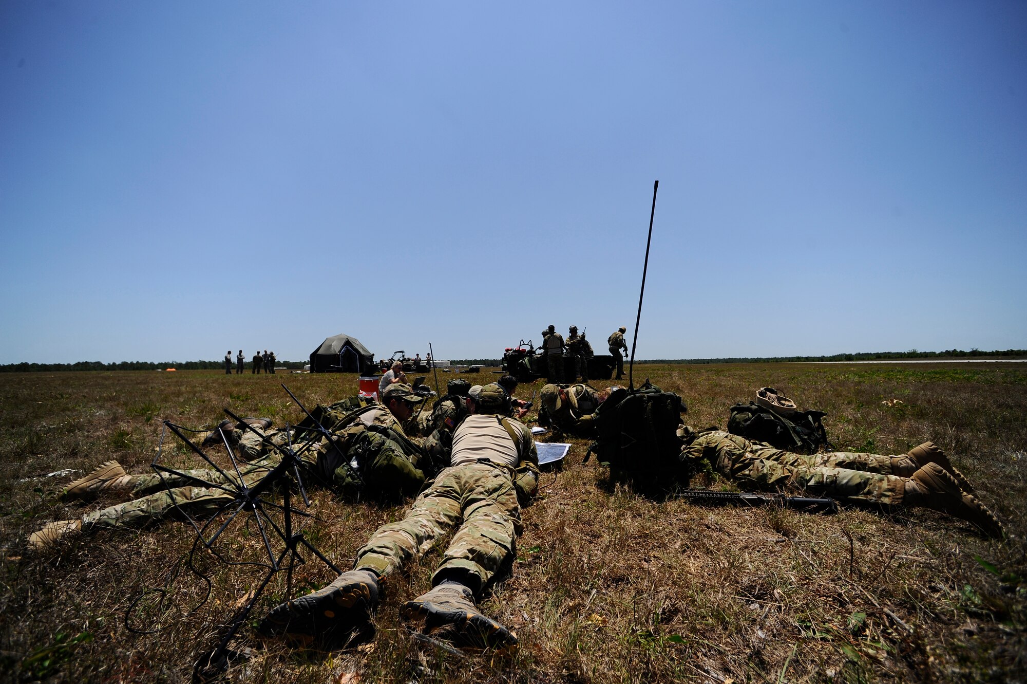 Key special tactics personnel rally together to discuss the next course of actions during a simulated disaster, Field 6, Eglin Air Force Base range, Fla., May 11, 2011. Operation Nimble Response is an exercise to hone humanitarian and disaster relief efforts. Close to 50 personnel from Head Quarters Air Force Special Operations Command, 1st Special Operations Wing, and 280th Combat Communications Squadron, in coordination with USAID, worked together to improve disaster response. (U.S. Air Force photo by Staff Sgt. Julianne M. Showalter/Released)
