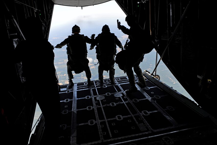 Special Operations Airmen jump off of a 9th Special Operations Squadron MC-130P platform to provide assistance to simulated ground forces, Field 6, Eglin Air Force Base range, Fla., May 11, 2011. Operation Nimble Response is an exercise to hone humanitarian and disaster relief efforts. Close to 50 personnel from Head Quarters Air Force Special Operations Command, 1st Special Operations Wing, and 280th Combat Communications Squadron, in coordination with USAID, worked together to improve disaster response. (U.S. Air Force photo by Staff Sgt. Julianne M. Showalter/Released)