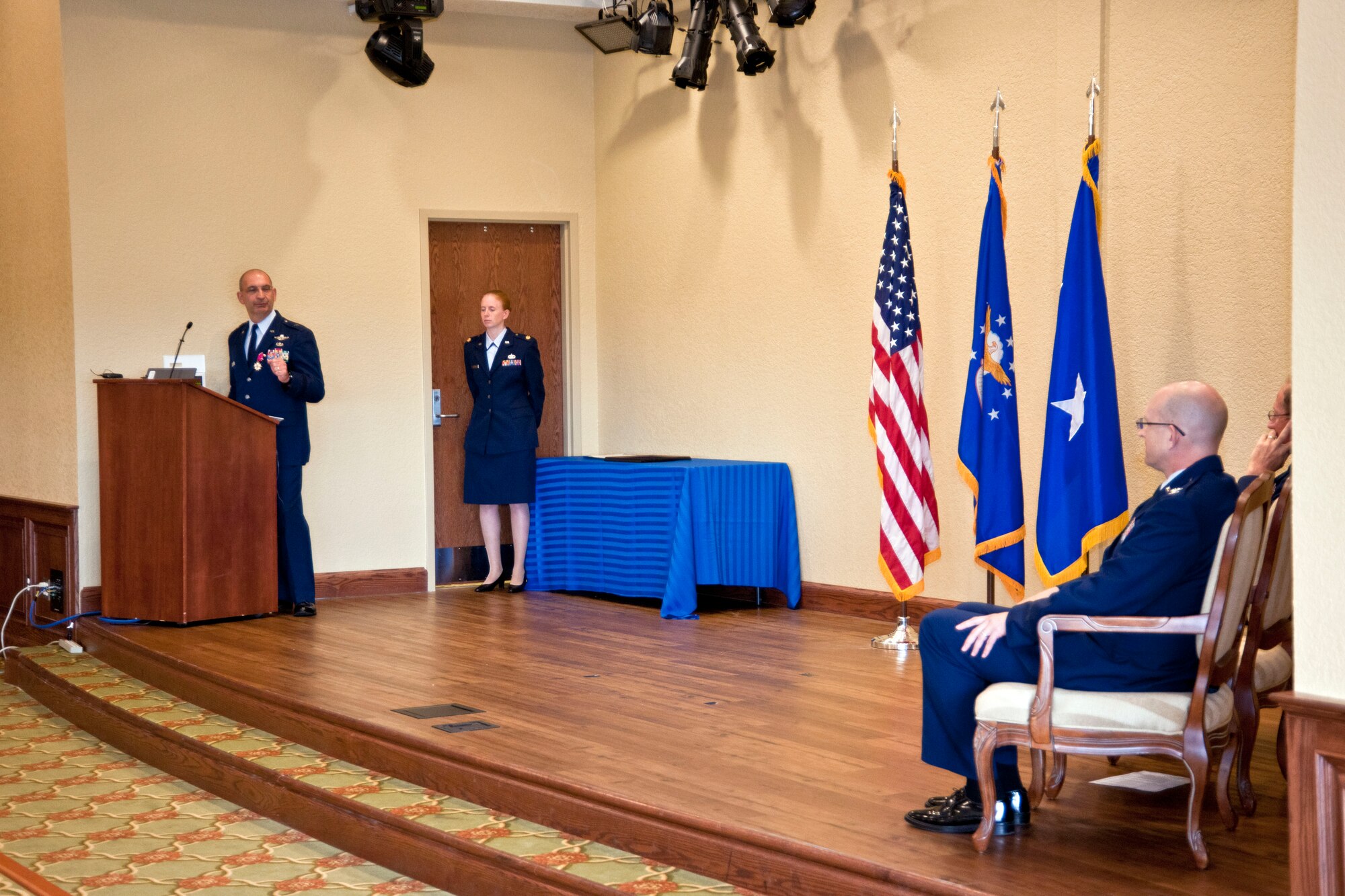 General Muscatell praises Colonel Jensen in a heartfelt goodbye speech to 403rd Wing members, community leaders and other Keesler AFB members who attended the change of command ceremony May 12 at the Bay Breeze Event Center.  (U.S. Air Force photo by Tech. Sgt. Tanya King)