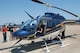 A young girl sits in the driver’s seat of a Louisiana State Police OH-58 helicopter. The Louisiana State Police and local police and sheriff’s offices all contributed various aircraft, vehicles and personnel to the air show as a show of the positive relationship Barksdale Air Force Base, La., enjoys with the surrounding communities. (courtesy photo by Staff Sgt. Matthew Connell, 26th Operational Weather Squadron) 