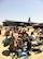 Spectators at the 2011 Defenders of Liberty Air Show at Barksdale Air Force Base, La., set up chairs and umbrellas around or under static aircraft in order to enjoy the aerial demonstrations throughout the day. (courtesy photo by Mr. Doug Maiden, 2nd Civil Engineer Squadron)