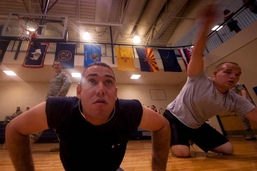 Senior Airman Jace McCarthy, 23rd Comptroller Squadron financial services technician, cranks out 20 push-ups toward the end of Moody’s First Sergeants push-up challenge at Moody Air Force Base, Ga. May 13. The challenge was put in place to give back to Airmen by raising money for future events through the First Sergeants Association. (U.S. Air Force photo/ Airman 1st Class Joshua Green)(RELEASED)
