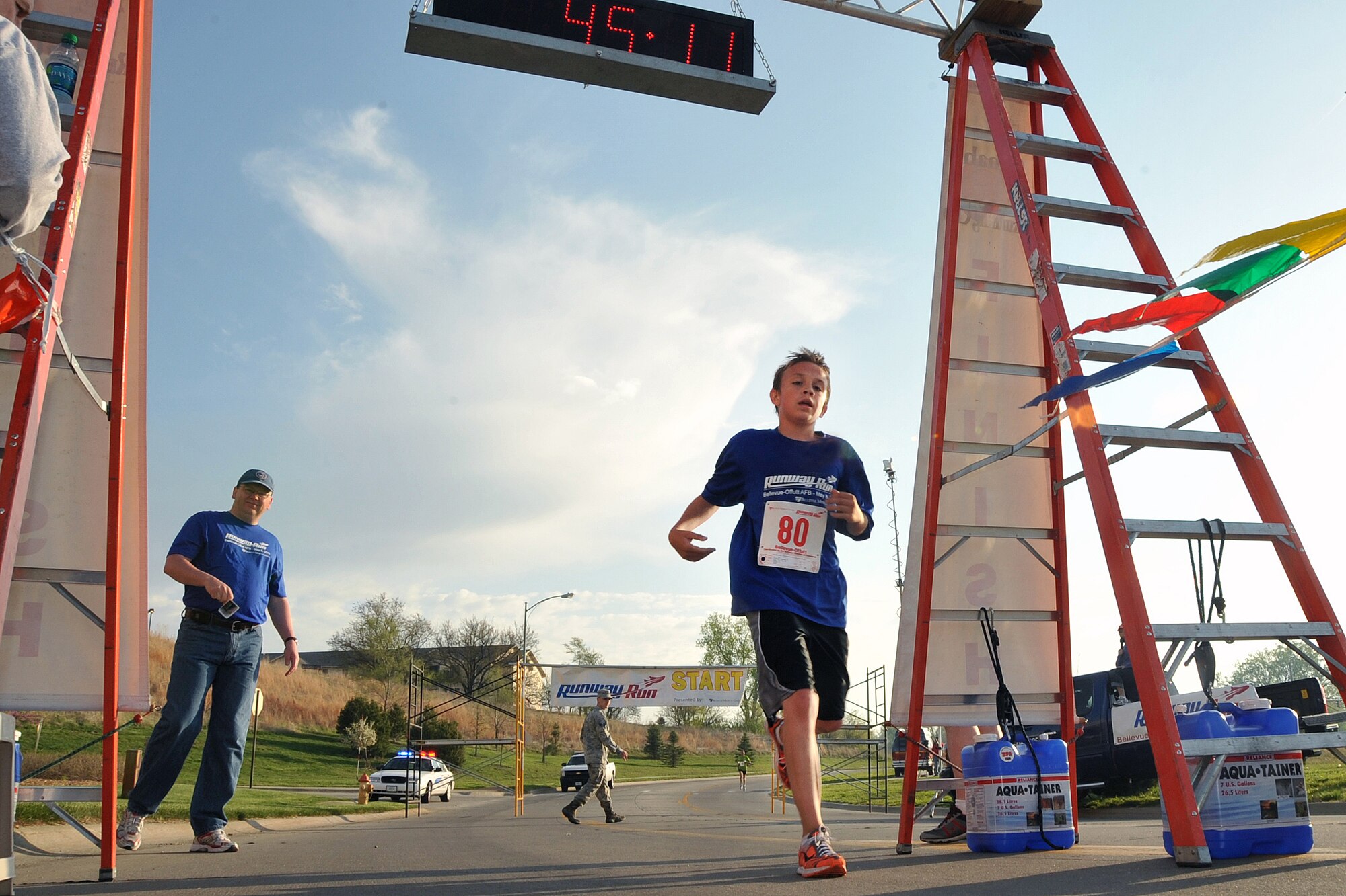 OFFUTT AIR FORCE BASE, Neb. -- Justin Liedke, age 13, finishes strong placing third place overall at the 4th Annual Bellevue-Offutt Runway Run May 8. Nearly 200 runners of all ages came to Bellevue to compete in the seven mile race.