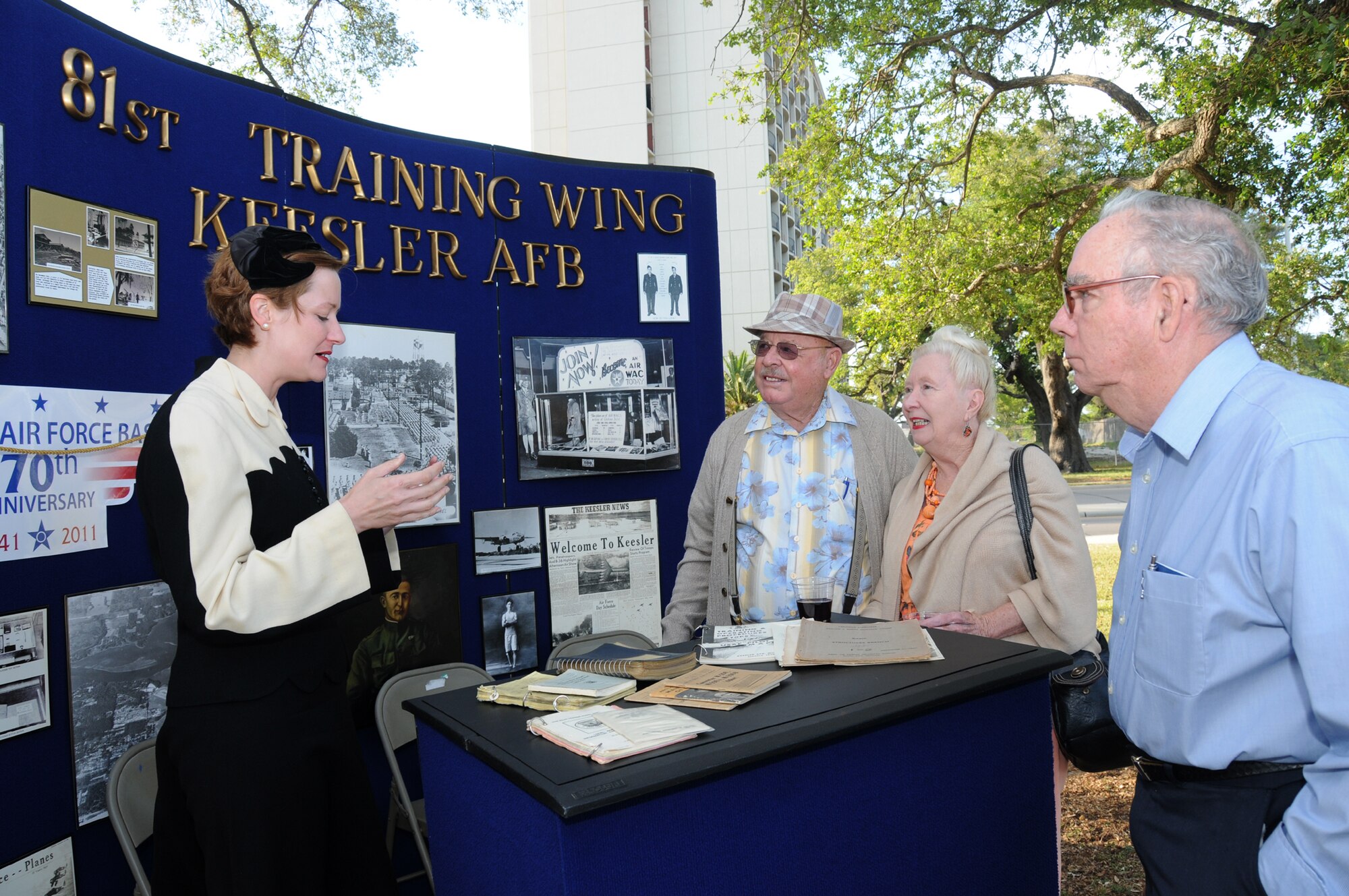 From left, Keesler historian Susan Dawson talks about Keesler’s 70th anniversary to Pete and Rosina LePre of Biloxi and William Miles of Ocean Springs during the City of Biloxi’s celebration of its military history, May 5 at Billy Guice Memorial Park and Glennan Park Mr. LePre is a Navy retiree and Mr. Miles is an Air Force retiree.  (U.S. Air Force photo by Kemberly Groue)