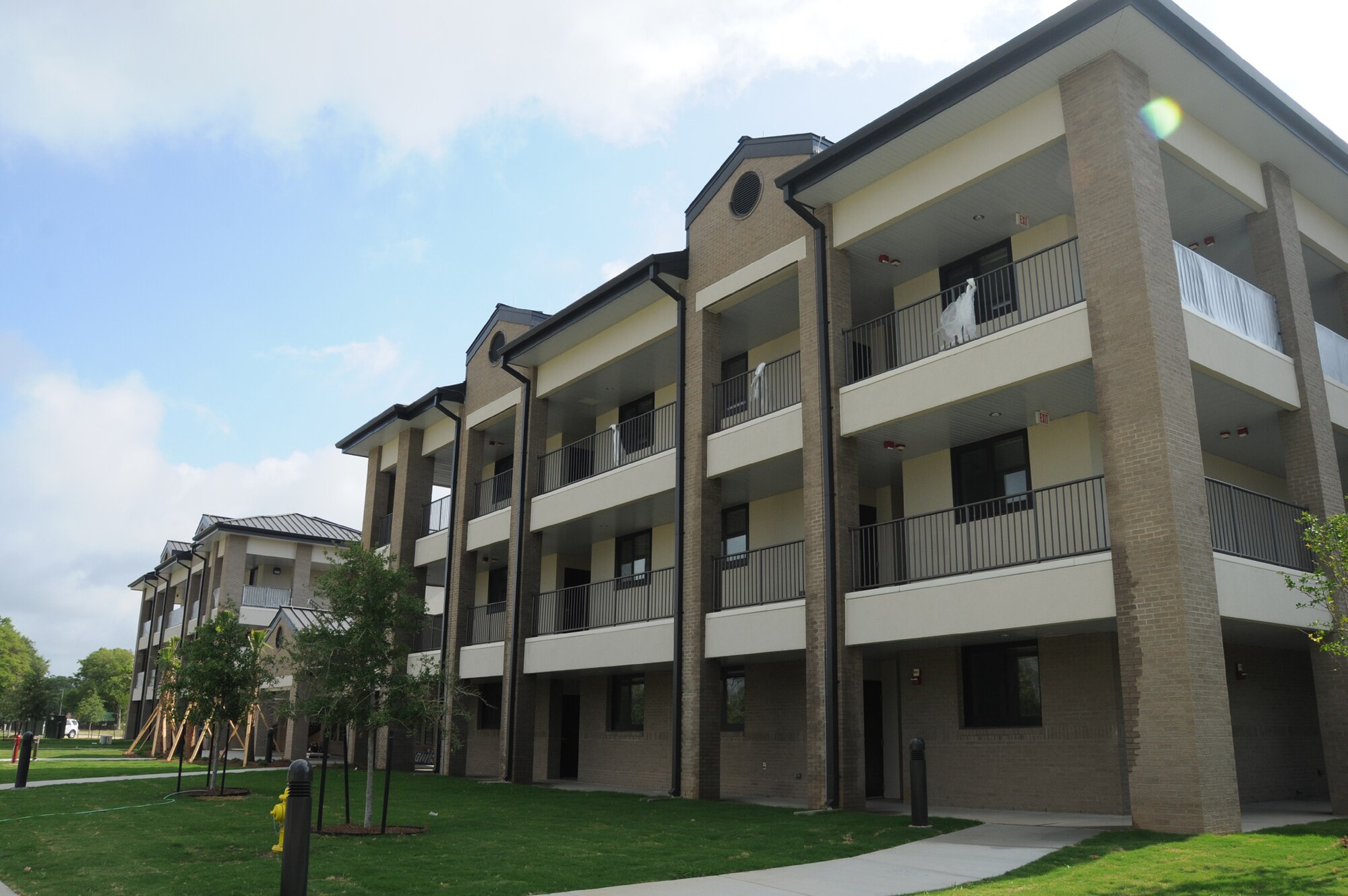 The new permanent party dormitory near the Meadows Drive Gate is nearing  completion.  It’s the first new permanent party dorm to be built at Keesler in 50 years. The $14,453,279 structure has been built by Anderson/Drace Construction. Project officials expect the building to be turned over to the government in late May or early June.  (U.S. Air Force photo by Kemberly Groue)