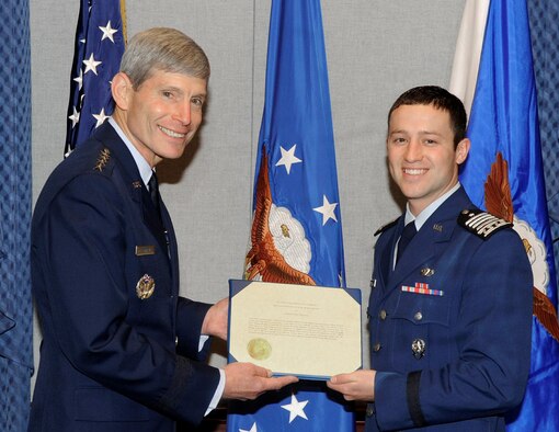 Air Force Chief of Staff Gen. Norton Schwartz presents the 2010 U.S. Air Force Cadet of the Year award to Air Force Academy Cadet Christopher J. McCool during a ceremony May 12, 2011, at the Pentagon. Cadet McCool earned the honor for demonstrated excellence in military skill, academics and athletics in an Air Force commissioning program. (U.S. Air Force photo/Andy Morataya)