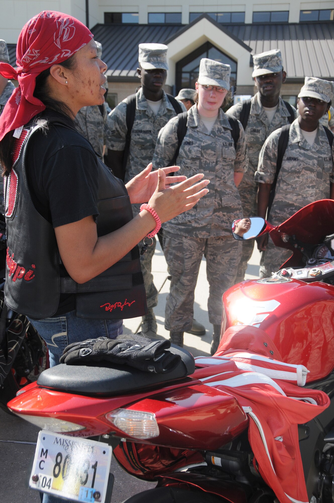 Master Sgt. Yolanda Jerry, 336th Training Squadron, speaks to a group of students
from her squadron on the importance of motorcycle safety in front of Holbrook
Manor, April 22.  (U.S. Air Force photo by Kemberly Groue)