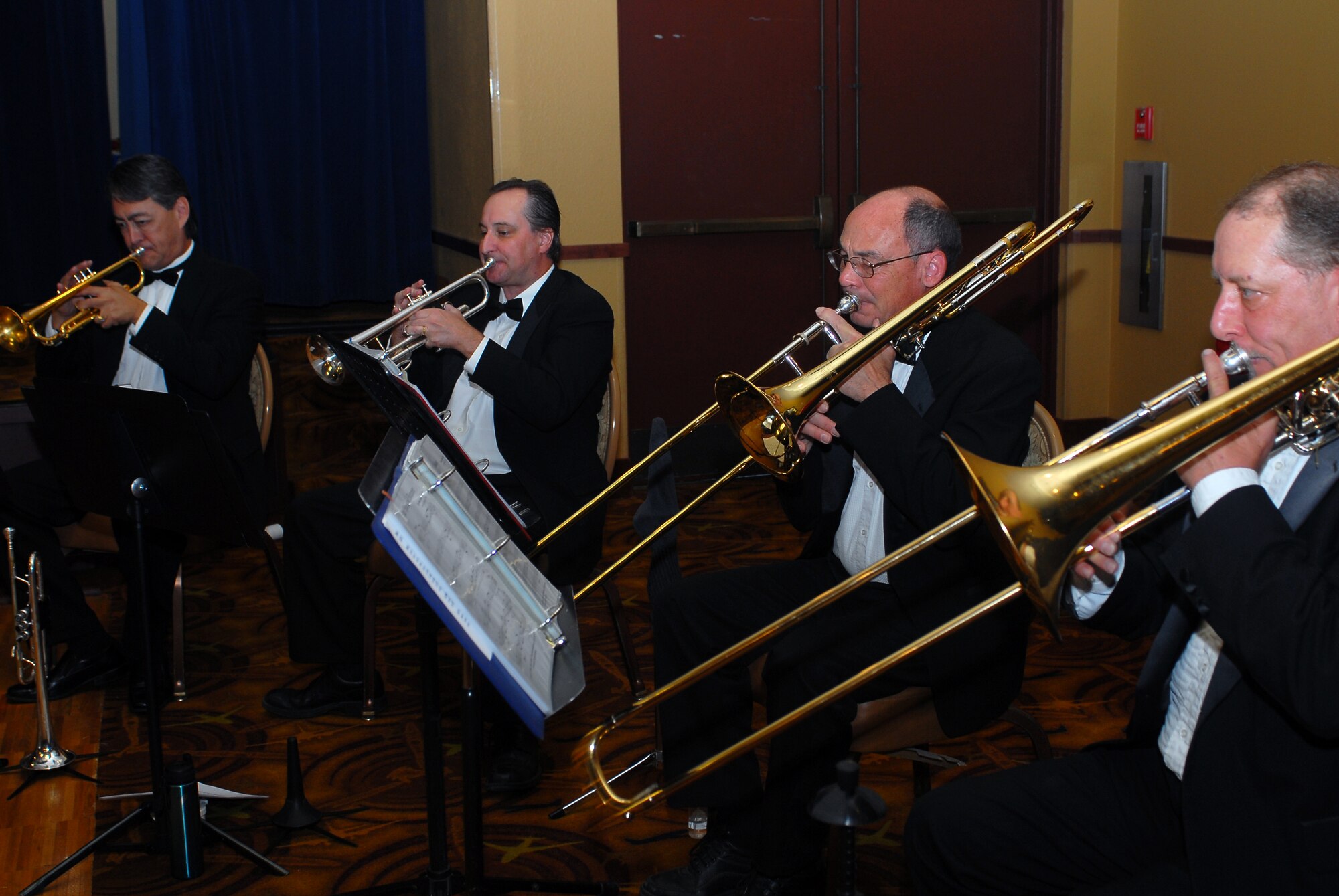Arizona Brass performs the National Anthem May 5 during the 2011 National Prayer Breakfast at Club Five Six.  The breakfast gave Luke members an opportunity to come together, regardless of religious background, and acknowledge the moral and spiritual values our nation was founded upon.  (U.S. Air Force photo by Senior Airman Tracie Forte)