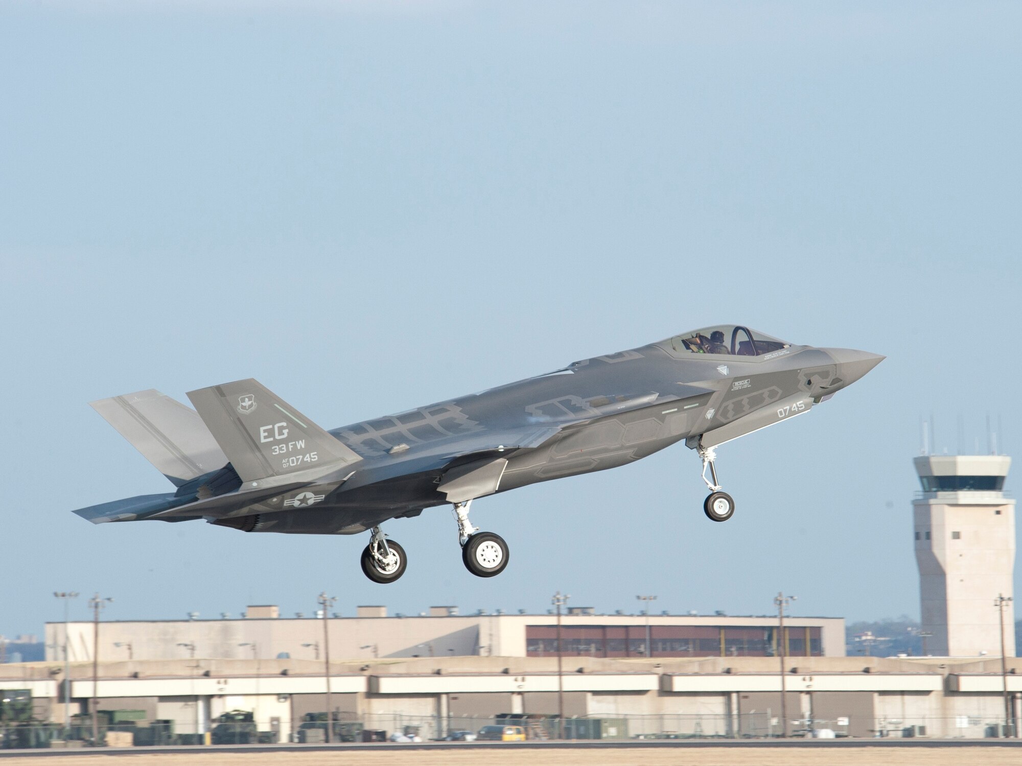 The first F-35A production aircraft that will be delivered to Eglin Air Force Base, Fla., later this year takes off from Naval Air Station Fort Worth Joint Reserve Base May 6 with Lockheed Martin test pilot Bill Gigliotti at the controls. The jet will go  to Edwards AFB, Calif., to support developmental testing shortly after the Air Force takes delivery. As the first of its kind in the Department of Defense, the 33rd Fighter Wing is responsible for F-35 A/B/C (Joint Strike Fighter) pilot and maintainer training for the Marine Corps, the Navy, the Air Force and, in the future, at least eight coalition partners. Initially, 59 aircraft and three flying squadrons, one for each service/aircraft variant, will be established at Eglin. (Courtesy photo)

