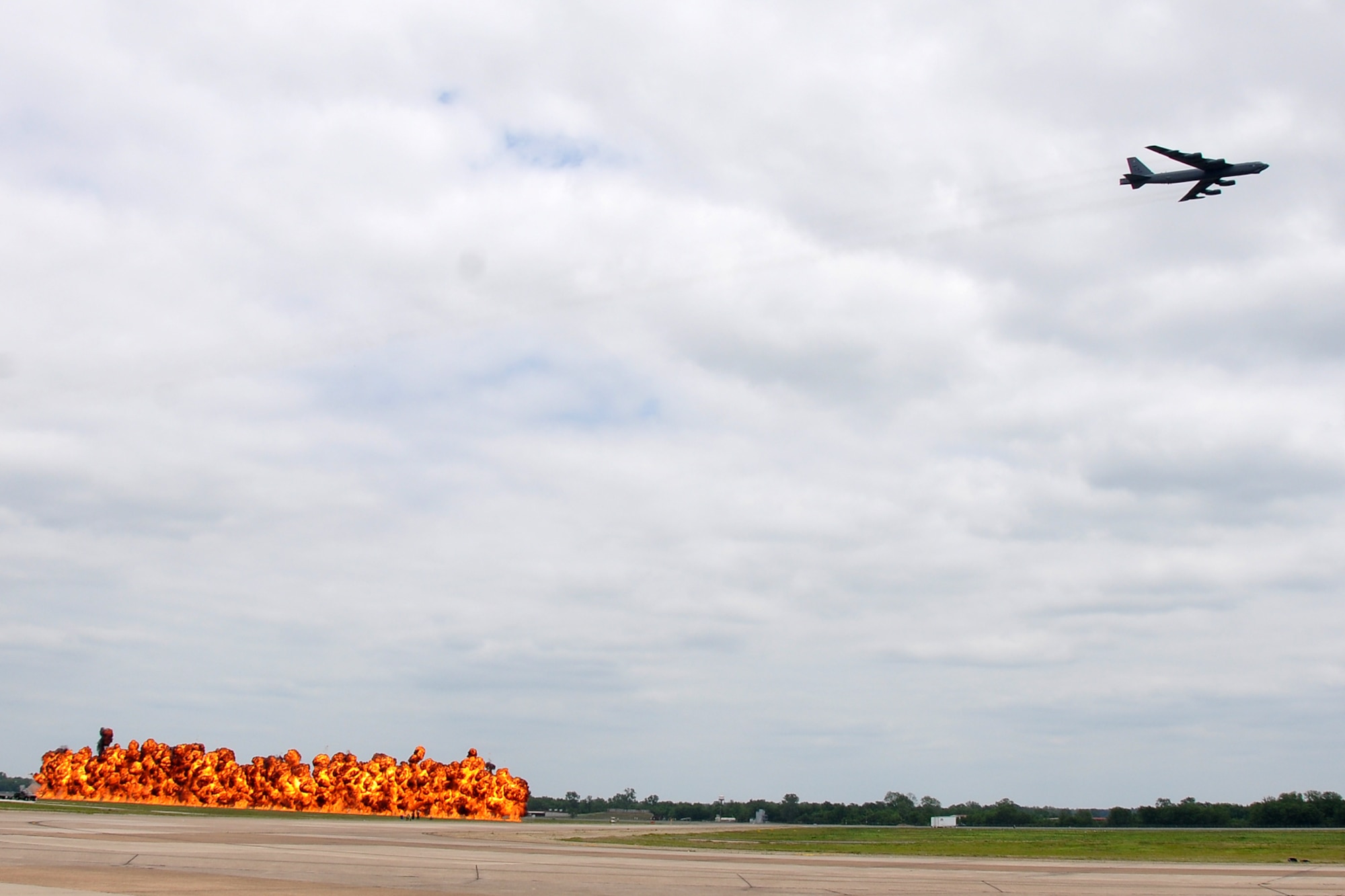 A wall of fire simulates the results of a bombing run by a B-52 Stratofortress during the 2011 Defenders of Liberty Air Show at Barksdale Air Force Base, La., May 8, 2011. Both the 307th Bomb Wing and 917th Fighter Group provided static displays for the air show. (U.S. Air Force photo/Tech. Sgt. Jeff Walston)