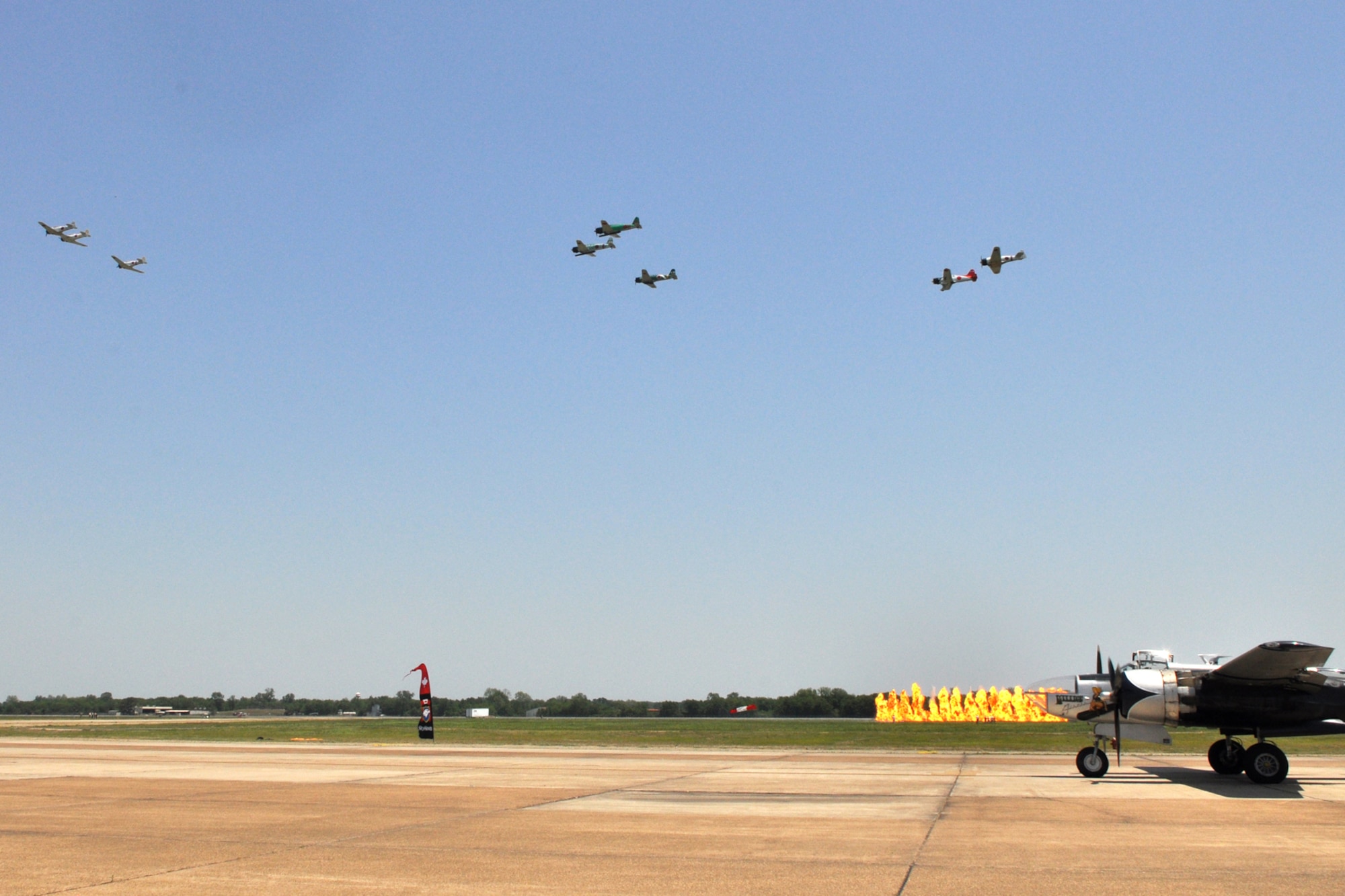 Replica Japanese aircraft from the Commemorative Air Force open the “Tora, Tora, Tora” performance with a wall of fire at the 2011 Defenders of Liberty Air Show at Barksdale Air Force Base, La., May 7, 2011. The CAF recreates the 1941 attack on Pearl Harbor at air shows across the country as a living history lesson. “Tora, Tora, Tora” is intended as a memorial to all the soldiers on both sides who gave their lives for their countries. Both the 307th Bomb Wing and 917th Fighter Group provided static displays for the air show. (U.S. Air Force photo/Tech. Sgt. Jeff Walston)