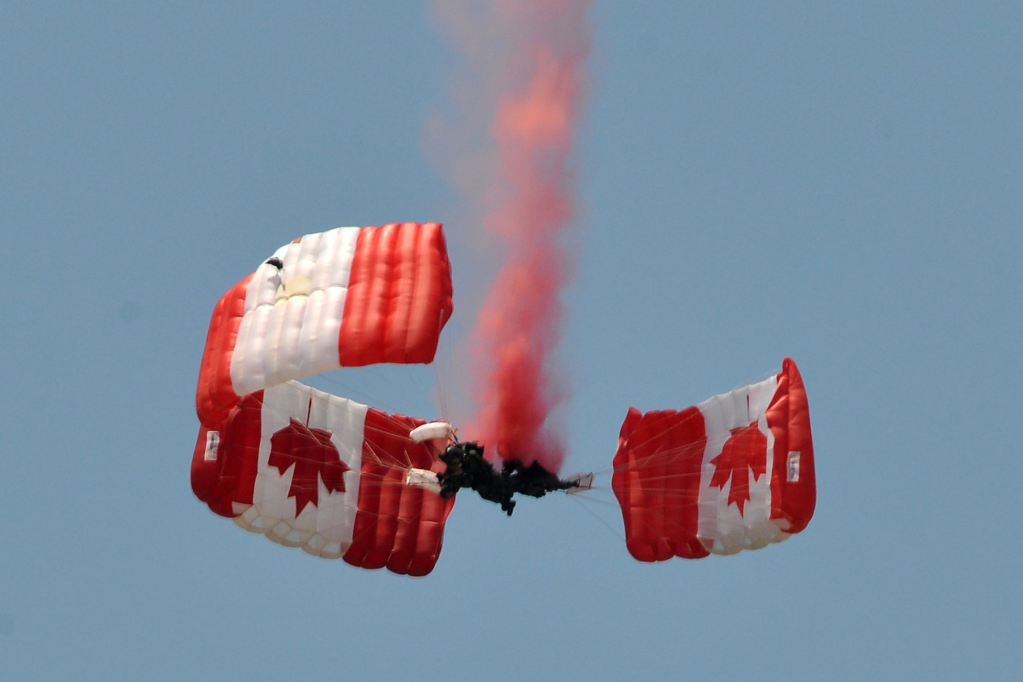 Members of the Canadian Forces Parachute Demonstration Team “Skyhawks” perform for an audience of thousands at the 2011 Defenders of Liberty Air Show on Barksdale Air Force Base, La., May 7, 2011. Both the 307th Bomb Wing and 917th Fighter Group provided static displays for the air show. (U.S. Air Force photo/Tech. Sgt. Jeff Walston)