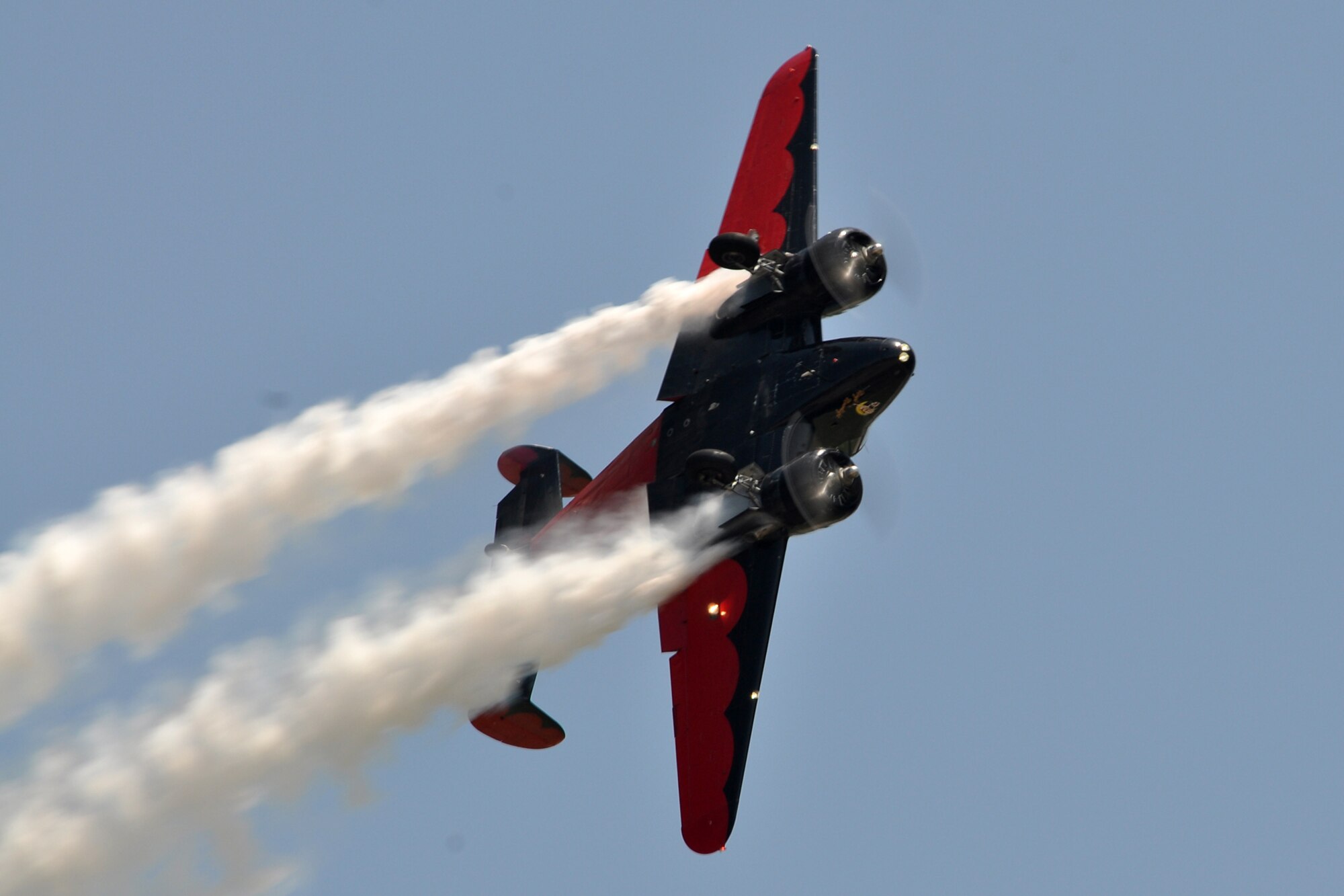 Matt Younkin wows the audience while flying a Twin Beech 18 during the 2011 Defenders of Liberty Air Show at Barksdale Air Force Base, La., May 7, 2011. Although the Beech 18 was not designed for aerobatic flight, Younkin showed the crowd it could be done. Both the 307th Bomb Wing and 917th Fighter Group provided static displays for the air show. (U.S. Air Force photo/Tech. Sgt. Jeff Walston)