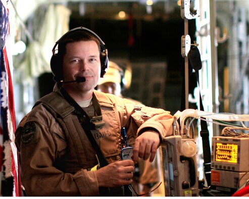 Tech. Sgt. Matthew Blonde pauses during a typical day at the 'office.'  Sergeant Blonde, 452nd Aeromedical Staging Squadron, is a member of the Critical Care Aeromedical Transport Team and a full-time, civilian respiratory therapist.  (Photo courtesy of TSgt. Matt Blonde)