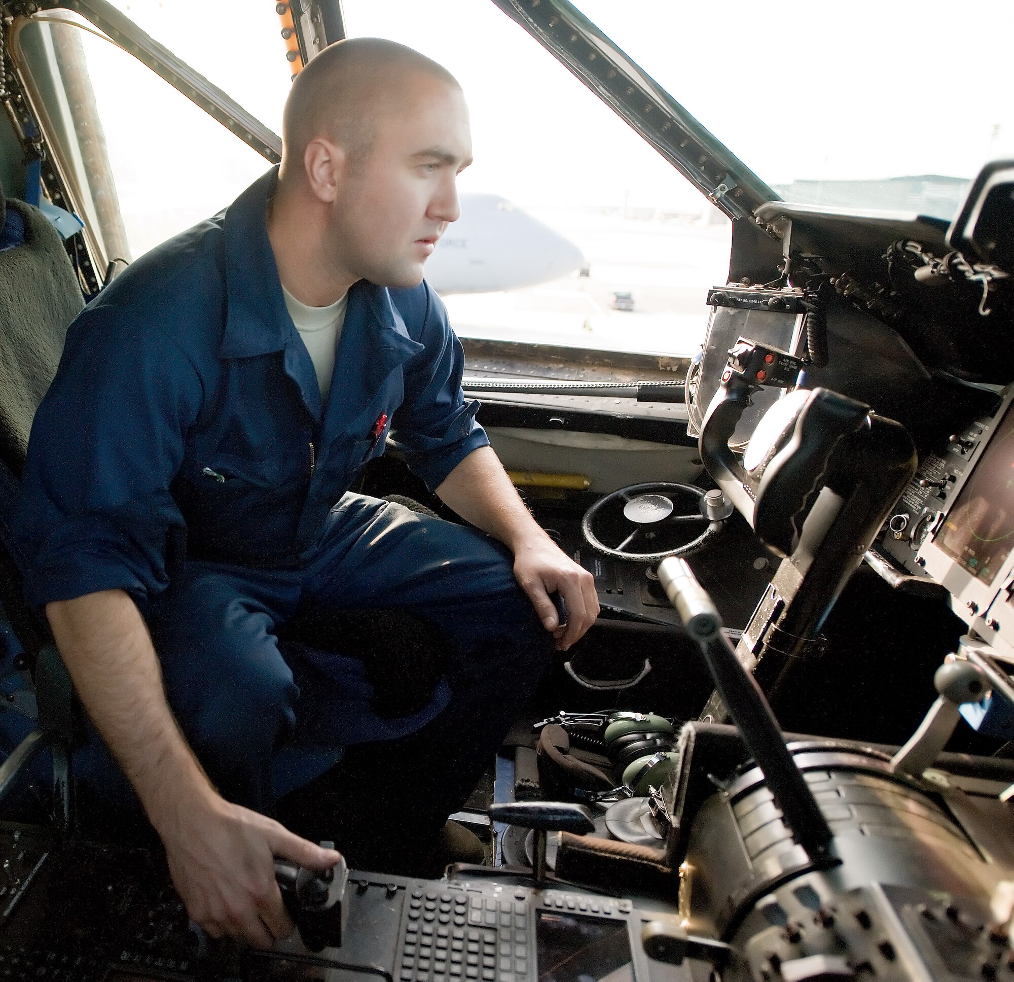Staff Sgt. Rob Sheppard, 436th Aircraft Maintenance Squadron flying crew chief, checks the emergency transmitter system of a C-5B Galaxy May 12, 2011, at Dover Air Force Base, Del. The system was reported to have issues, which were soon fixed by Sergeant Sheppard. (U.S. Air Force photo by Airman 1st Class Jacob Morgan)