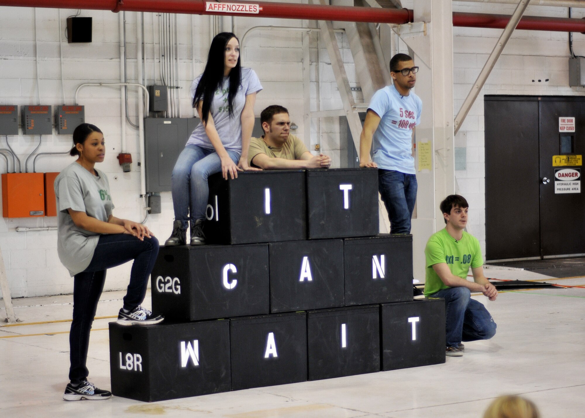 Members of the Niagara County Community College Theatre Arts Department perform “It Can Wait” as part of the Niagara Regional Traffic Safety Program, May 9-18, 2011 Niagara Falls Air Reserve Station, NY. The performance included music, dance and scenes depicting the consequences of texting while driving. (U.S. Air Force photo by Staff Sgt. Joseph McKee)