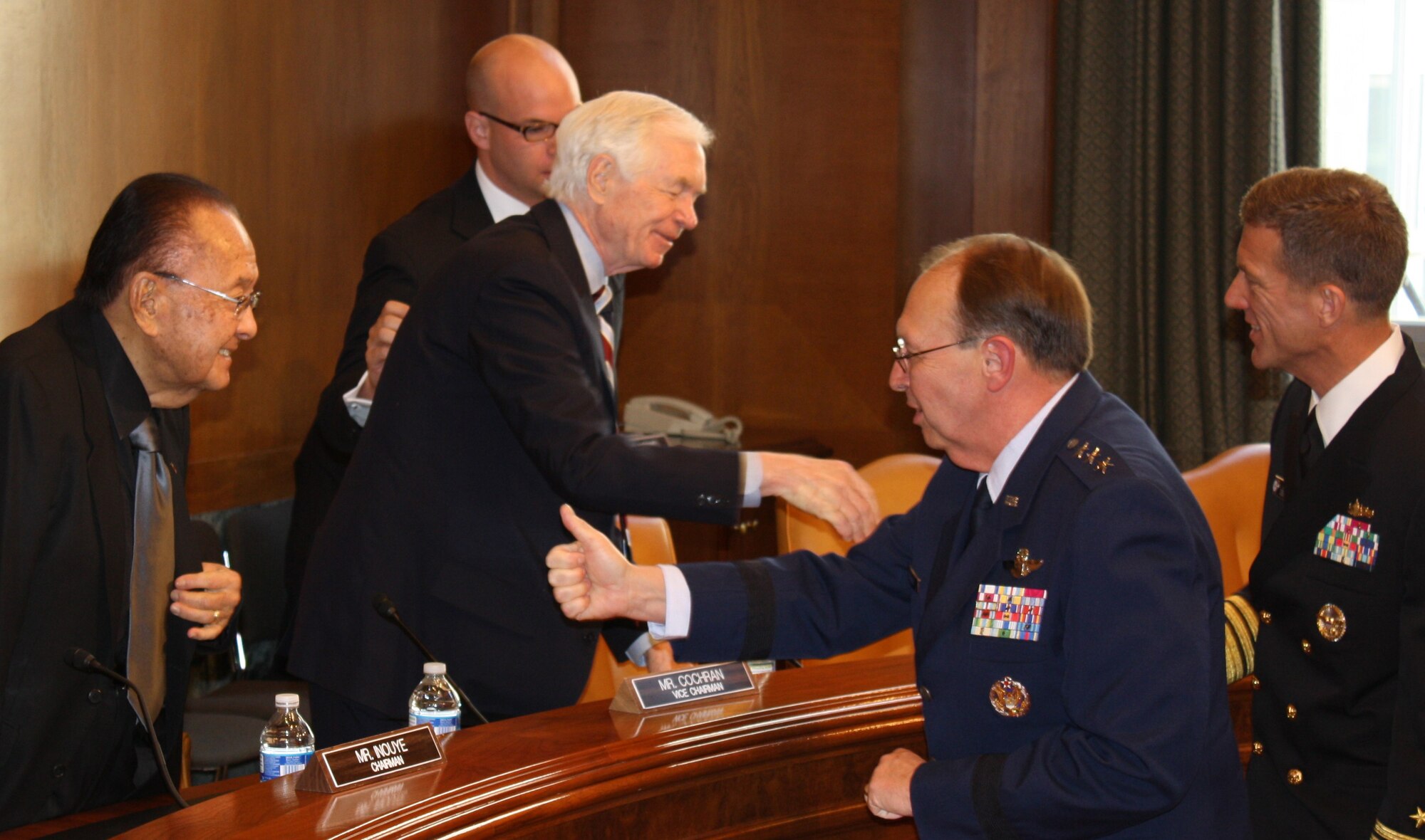 Lt. Gen. Charles E. Stenner Jr., (center), gives a thumbs-up signal to Sen. Daniel K. Inouye (D-Hawaii), chairman of the U.S. Senate Committee on Appropriations, as Sen. Thad Cochran (R-Miss.), vice chairman, shakes hands with Vice Adm. Dirk Debbink, chief of Navy Reserve.  Reserve Component leaders testified to the committee about their proposed FY12 budget on Capitol Hill, May 11, 2011.  The FY12 budget request has about $5 billion to fund Air Force Reserve requirements. This includes the operation and training of 34 wings, funds 117,769 flying hours, maintains 344 aircraft, and provides for the readiness of 71,400 Reservists and 4,157 civilian employees. (U.S. Air Force photo/Col. Bob Thompson)