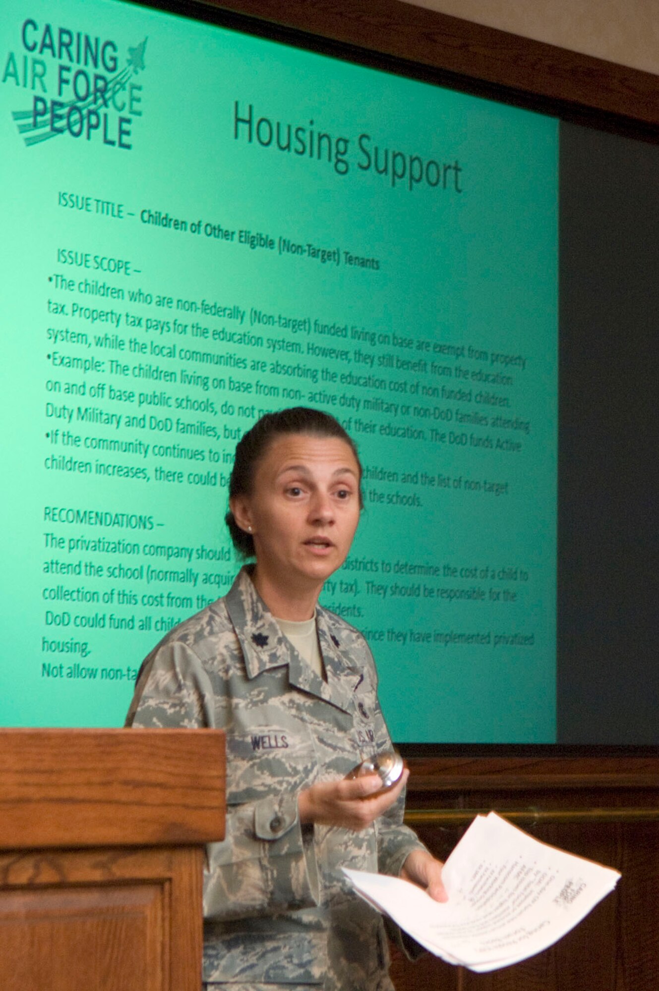 HANSCOM AIR FORCE BASE, Mass. – Lt. Col. Melissa Wells, Community Action Information Board executive director, briefs the results of the Caring for People forum to senior leaders at the Hanscom Conference Center May 3. CfP is a way for Air Force leaders to receive community feedback. Previous forums have been successful in strengthening support services and relaying service gaps directly to senior leadership. (U.S. Air Force photo by Mark Wyatt)