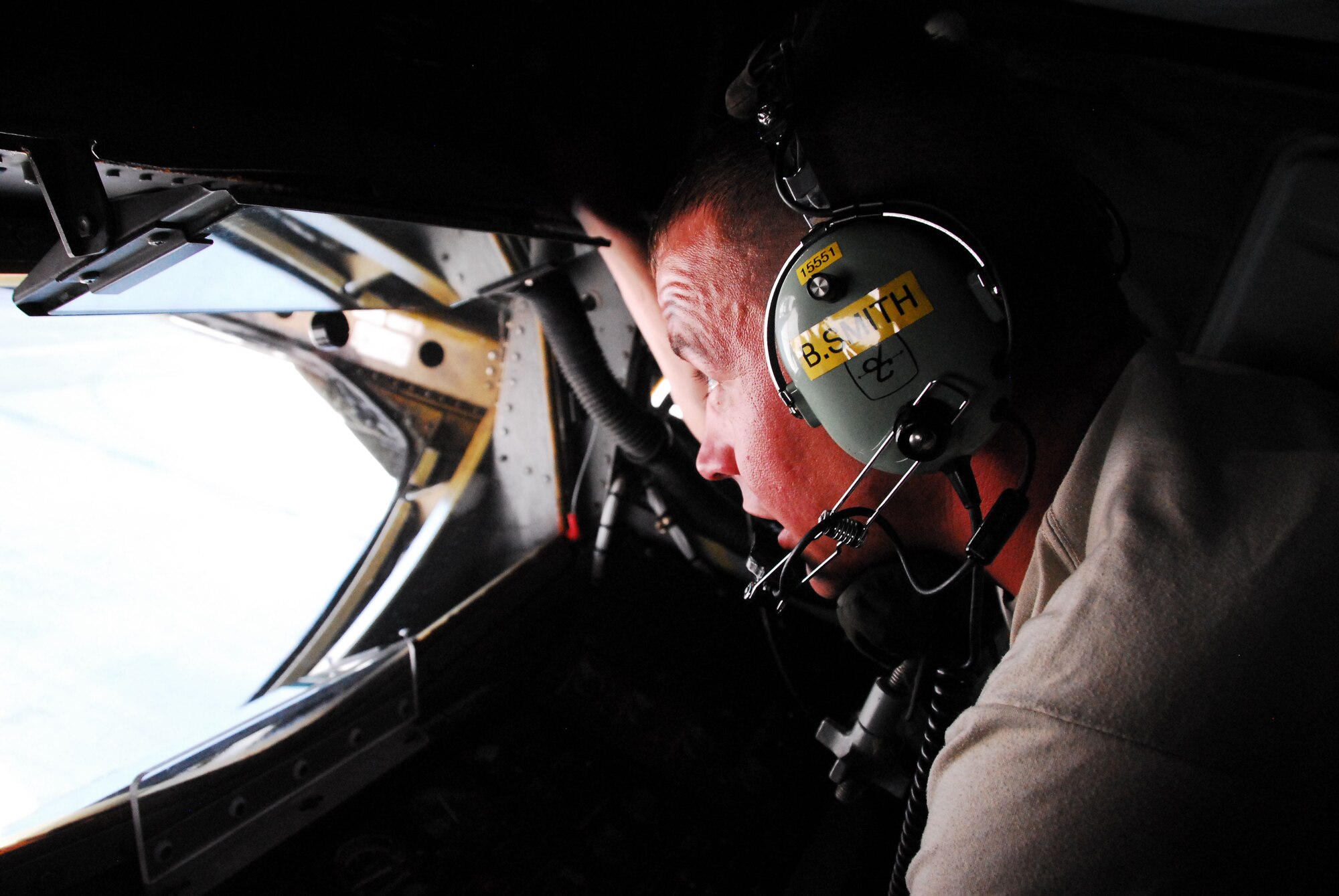WESTERN EUROPE (May 10, 2011) -- Tech. Sgt. Ben Smith, 171st Air Refueling Wing, Pittsburgh, performs a function check on the lights of a KC-135 Stratotanker from the 91st Air Refueling Squadron, MacDill Air Force Base, Fla. Currently assigned to the 313th Air Expeditionary Wing, he is a member of the maintenance group responsible for maintaining the wing's aircraft fleet. The wing supports Operation Unified Protector, a NATO-led mission in Libya to protect civilians and civilian-populated areas under threat of attack. The 313th AEW provides aerial refueling to U.S. and coalition aircraft with KC-135 Stratotankers and KC-10 Extenders. (U.S. Air Force photo by Tech. Sgt. Stacy Gault/Released)