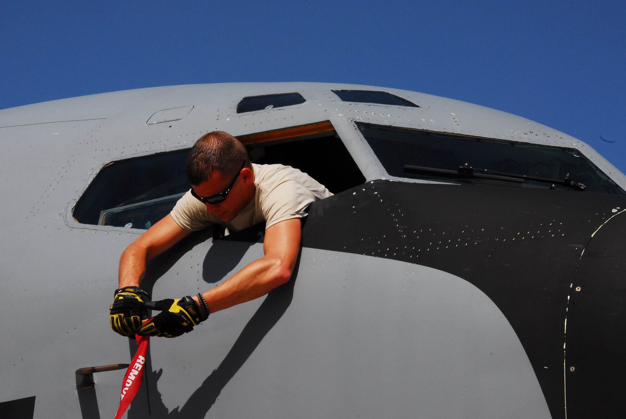 WESTERN EUROPE (May 10, 2011) -- Tech. Sgt. Ben Smith, 171st Air Refueling Wing, Pittsburgh, puts on the pitot covers of a KC-135 Stratotanker from 91st Air Refueling Squadron, MacDill Air Force Base, Fla. Currently assigned to the 313th Air Expeditionary Wing, he is a member of the maintenance group responsible for maintaining the wing's aircraft fleet. The wing supports Operation Unified Protector, a NATO-led mission in Libya to protect civilians and civilian-populated areas under threat of attack. The 313th AEW provides aerial refueling to U.S. and coalition aircraft with KC-135 Stratotankers and KC-10 Extenders. (U.S. Air Force photo by Tech. Sgt. Stacy Gault/Released)