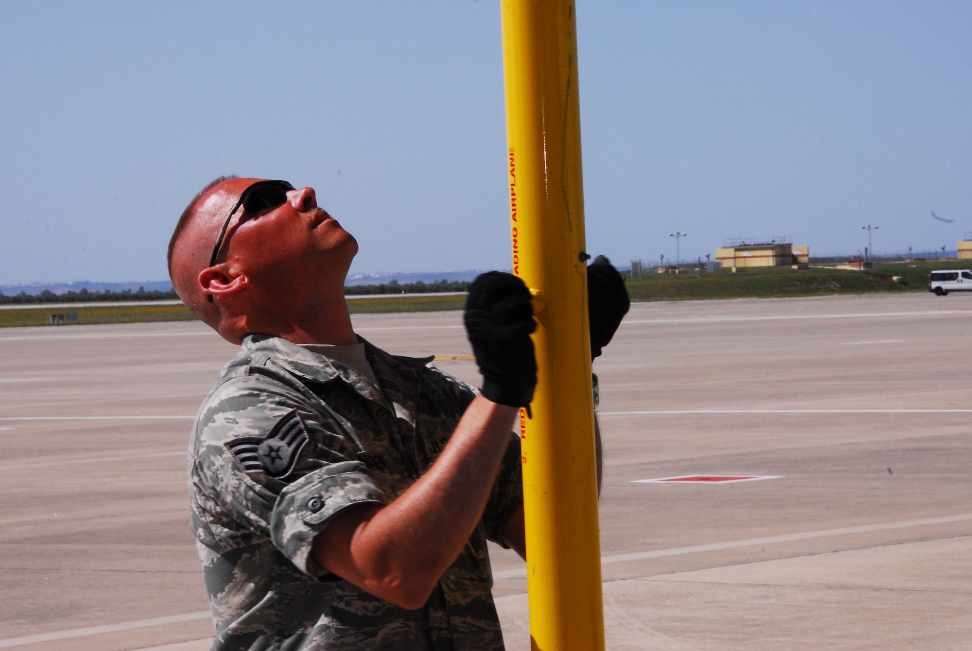 WESTERN EUROPE (May 10, 2011) -- Staff Sgt. Brian Thomsen, 171st Air Refueling Wing, Pittsburgh, props up the tail stand of a KC-135 Stratotanker following an aerial refueling over the Mediterranean Sea. Currently assigned to the 313th Air Expeditionary Wing, he is a member of the maintenance group responsible for maintaining the wing's aircraft fleet. The wing supports Operation Unified Protector, a NATO-led mission in Libya to protect civilians and civilian-populated areas under threat of attack. The 313th AEW provides aerial refueling to U.S. and coalition aircraft with KC-135 Stratotankers and KC-10 Extenders. (U.S. Air Force photo by Tech. Sgt. Stacy Gault/Released)