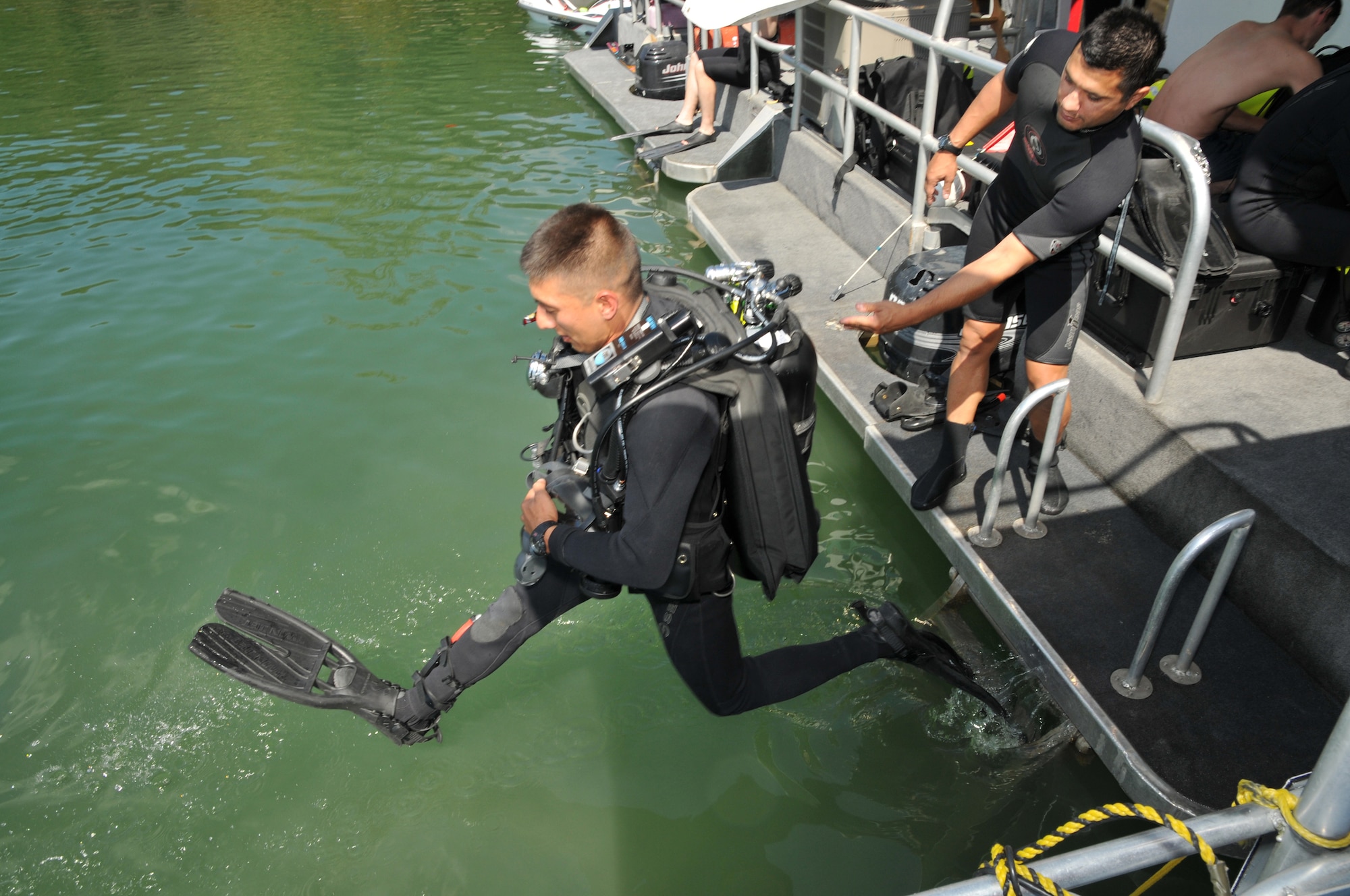 Master Sgt. Mario Romero, pararescueman for the Kentucky Air National Guard123d Special Tactics Squadron, jumps into Hollow Lake Sept. 17, 2010, during an training exchange with Ecuadorian military and civil authorities through Kentucky’s State Partnership Exchange Program. (U.S. Air Force photo by Staff Sgt. Jason Ketterer)