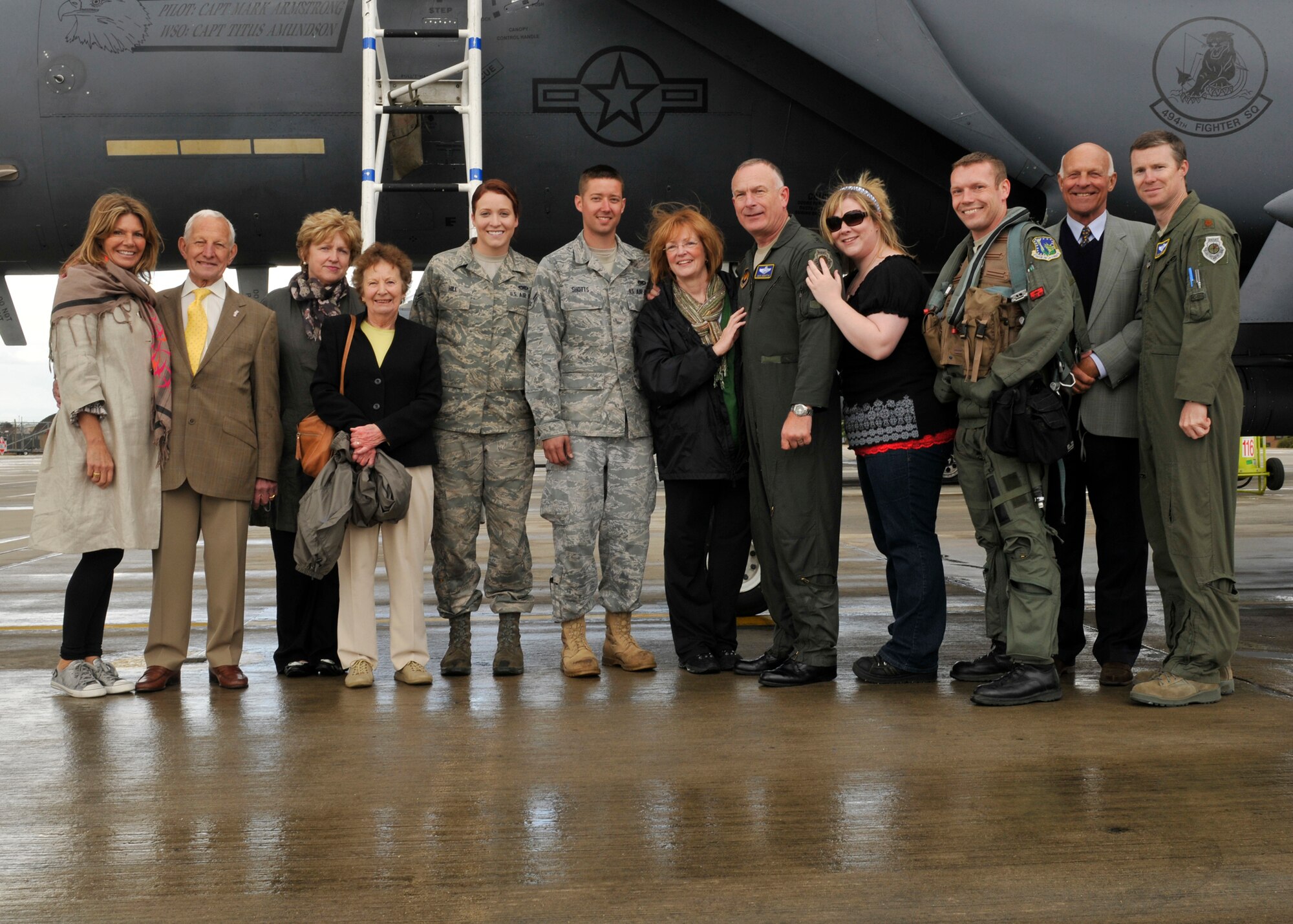 ROYAL AIR FORCE LAKENHEATH, England - Family members, friends, Liberty Warriors and Maj. Gen. Jack Egginton, U.S.Air Forces in Europe director of Air and Space Operations, Ramstein Air Base, Germany, stand in front of a F-15E Strike Eagle after General Egginton's fini-flight on May 12, 2011. General Egginton finishes his Air Force career as a command pilot with more than 3,600 flying hours, including 480 combat hours flying close air support for coalition ground forces in Afghanistan and Iraq. (U.S. Air Force photo/Senior Airman Tiffany M. Deuel)