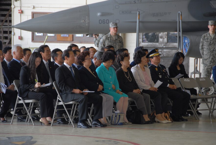 KUNSAN AIR BASE, Republic of Korea – Leaders and members of the Gunsan City community watch as Lt. Gen. Jeffrey Remington presents the Legion of Merit award to Col. John Dolan, former 8th FW commander, during the wing change of command ceremony in Hangar 3 here May 13. General Remington, the Deputy Commander, United Nations Command Korea; Deputy Commander, U.S. Forces Korea; Commander, Air Component Command, Republic of Korea; U.S. Combined Forces Command; and 7th Air Force commander, presided over the ceremony. (U.S. Air Force photo/Staff Sgt. Amanda Savannah)