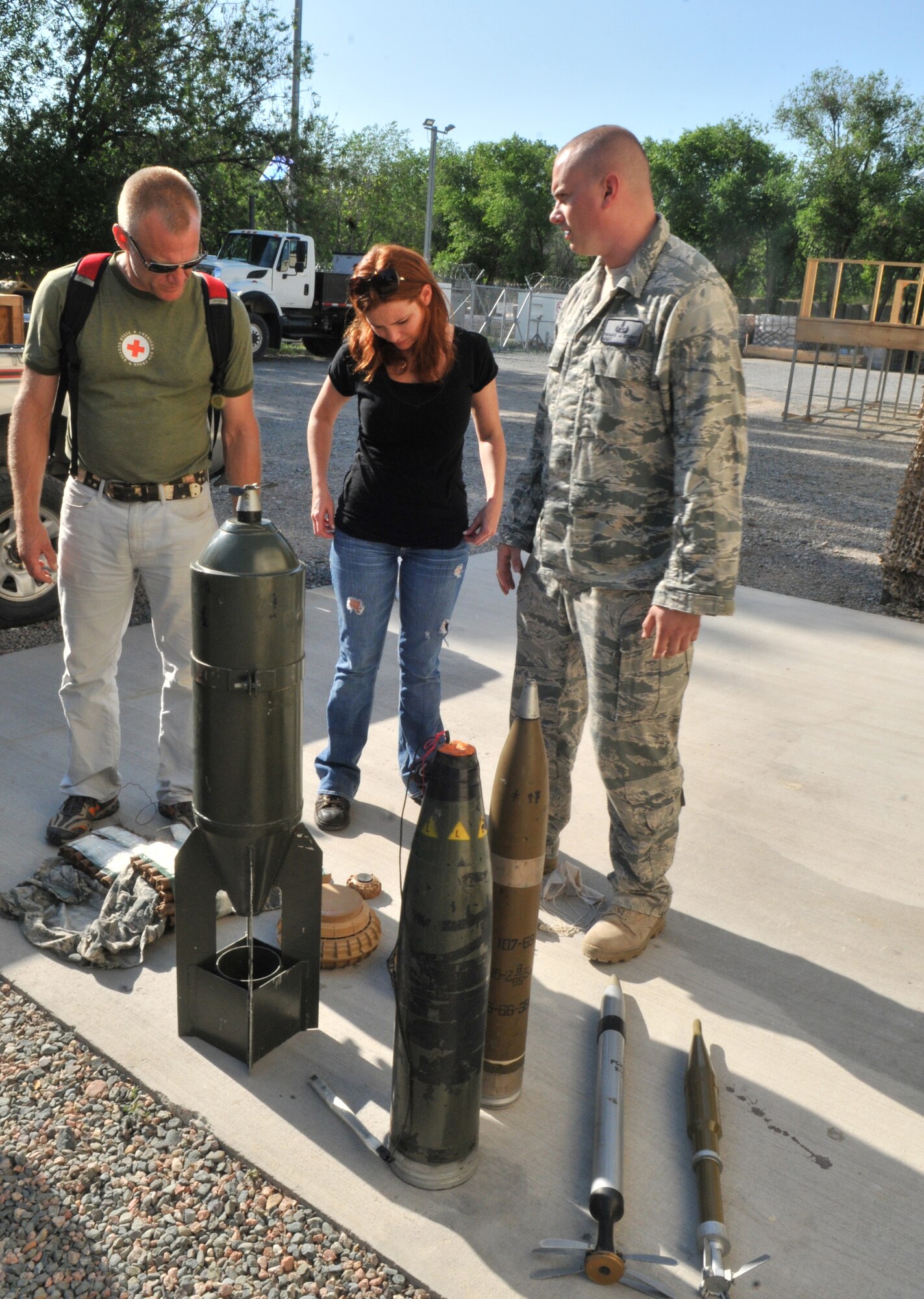 TRANSIT CENTER AT MANAS, Kyrgyzstan -- Brigid Brannagh and Terry Serpico, actors from the show Army Wives, visit the Transit Center as a part of an Armed Forces Entertainment tour on May 12.  Brigit and Terry took a tour of Security Forces, Explosive Ordnance Disposal, a KC-135 Stratotanker and a C-17 Globemaster III. Later in the evening they were able to talk to the troops and sign autographs. (U.S. Air Force photo/Staff Sgt. Stacy Moless)
