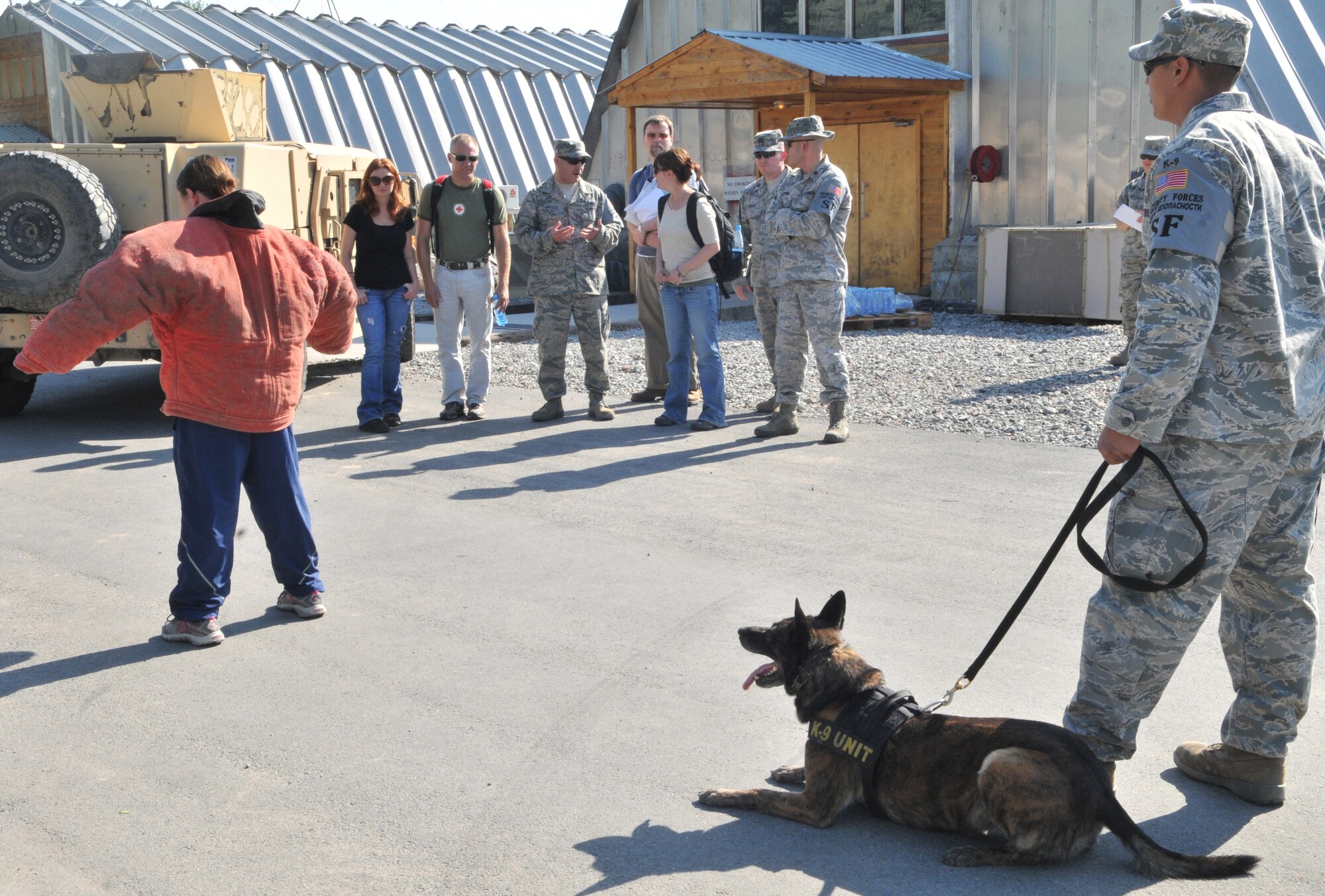 TRANSIT CENTER AT MANAS, Kyrgyzstan -- Brigid Brannagh and Terry Serpico, actors from the show Army Wives, visit the Transit Center as a part of an Armed Forces Entertainment tour on May 12.  Brigit and Terry took a tour of Security Forces, Explosive Ordnance Disposal, a KC-135 Stratotanker and a C-17 Globemaster III. Later in the evening they were able to talk to the troops and sign autographs. (U.S. Air Force photo/Staff Sgt. Stacy Moless)
