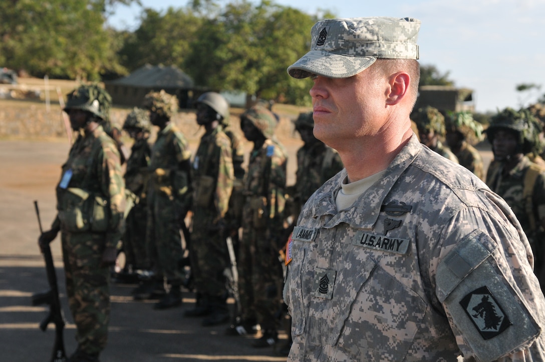 Army Sgt. Maj. Shane Lammers, sergeant major of the Illinois National Guard’s 404th Maneuver Enhanced Brigade, stands in formation during closing ceremonies for Medreach 11 in Lilongwe, Malawi, May 12, 2011. U.S. Army photo by Sgt. Jesse Houk