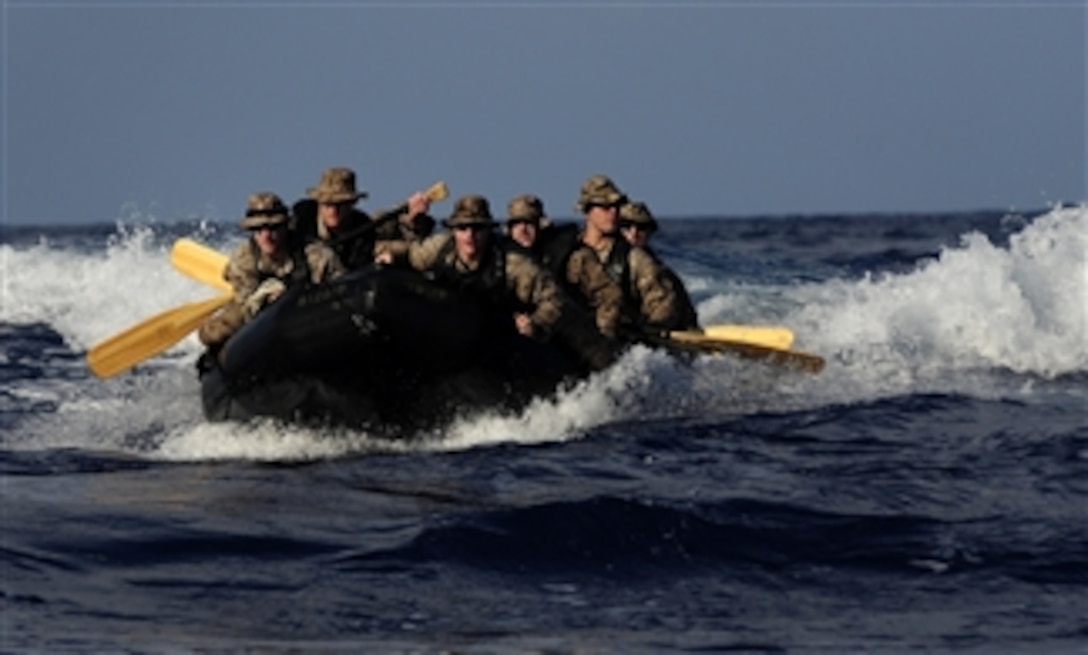 U.S. Marines embarked aboard the amphibious assault ship USS Bataan (LHD 5) participate in small boat operations with the amphibious transport dock ship USS Mesa Verde (LPD 19) in the Mediterranean Sea on May 7, 2011.  The Mesa Verde, part of the Bataan Amphibious Ready Group, deployed to support maritime security operations and theater security cooperation efforts in the U.S. 6th Fleet's area of responsibility.  