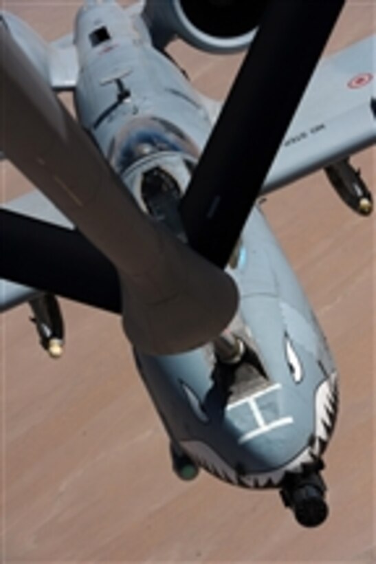 A U.S. Air Force A-10 Thunderbolt II aircraft assigned to the 74th Fighter Squadron receives fuel from a KC-135 Stratotanker aircraft with the 340th Expeditionary Air Refueling Squadron over Afghanistan in support of Operation Enduring Freedom on May 8, 2011.  