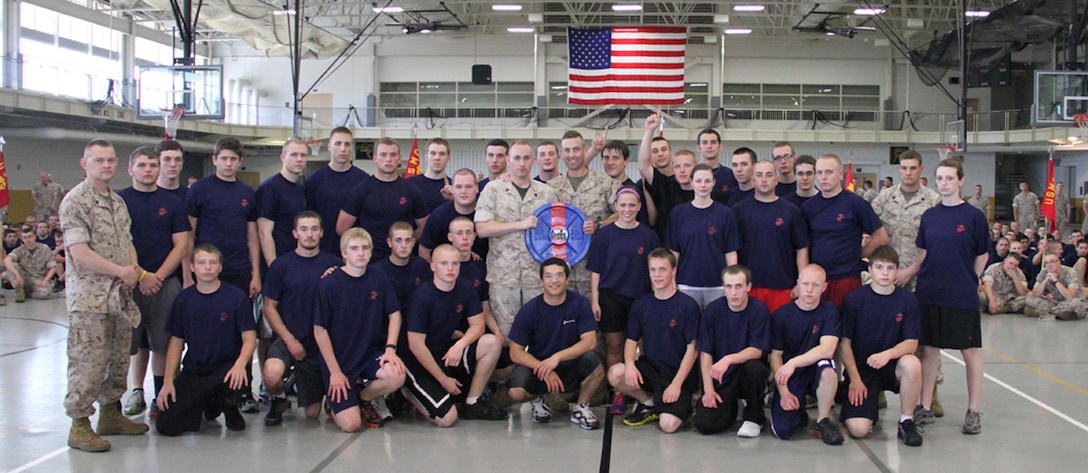 Recruiting Sub-station Fort Wayne North, Recruiting Station Indianapolis, Ind., poses for a photo as the first place winners with Maj. Lance Langfeldt, commanding officer, RS Indianapolis, at the end of the State Wide, May 14, 2011. The State Wide is a annual competition between the sub-stations of RS Indianapolis.