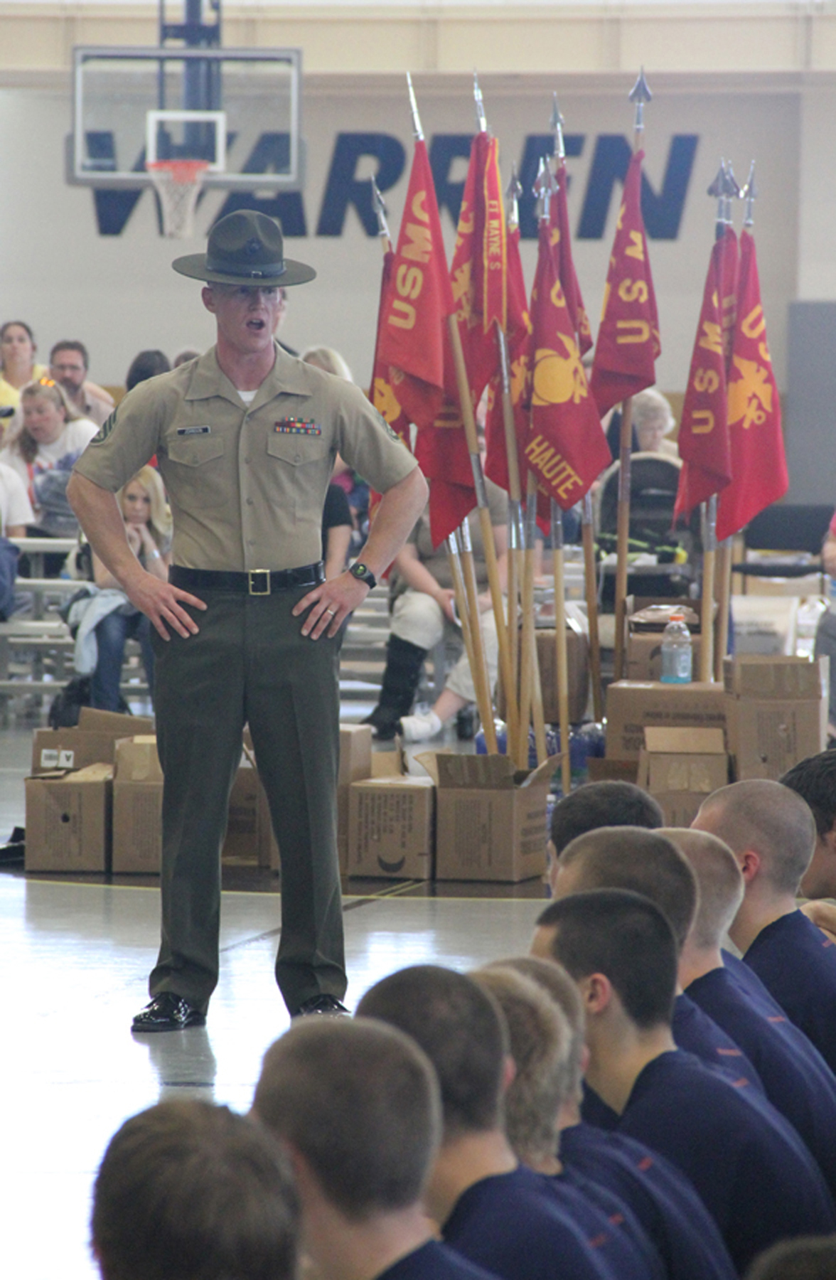 SSgt. Jonas Johnson, drill instructor, Marine Corps Recruit Depot San Diego, speaks to the enlistees from Recruiting Station Indianapolis about what to expect during recruit training at the State Wide, May 14, 2011. The State Wide is a annual competition between the sub-stations of RS Indianapolis.