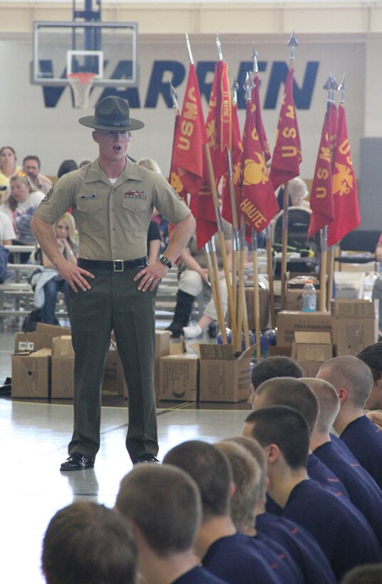 SSgt. Jonas Johnson, drill instructor, Marine Corps Recruit Depot San Diego, speaks to the enlistees from Recruiting Station Indianapolis about what to expect during recruit training at the State Wide, May 14, 2011. The State Wide is a annual competition between the sub-stations of RS Indianapolis.