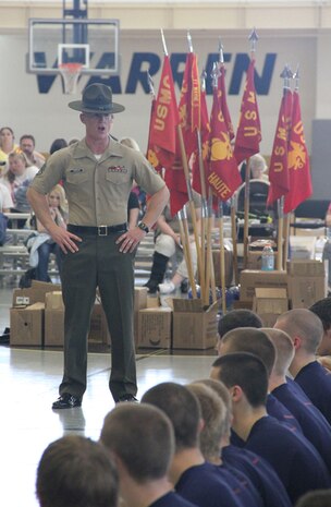 SSgt. Jonas Johnson, drill instructor, Marine Corps Recruit Depot San Diego, speaks to the enlistees from Recruiting Station Indianapolis about what to expect during recruit training at the State Wide, May 14, 2011. The State Wide is a annual competition between the sub-stations of RS Indianapolis.