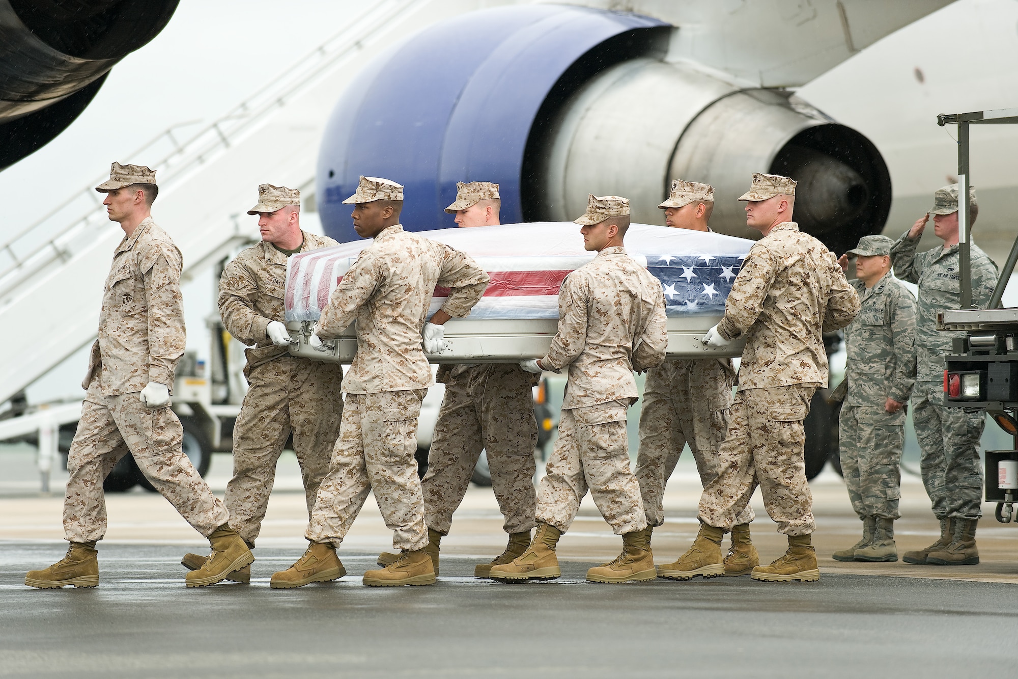 A U.S. Marine Corps carry team transfers the remains of Marine Sgt. Kevin B. Balduf, of Nashville, Tenn., at Dover Air Force Base, Del., May 14, 2011. (U.S. Air Force photo/Roland Balik)