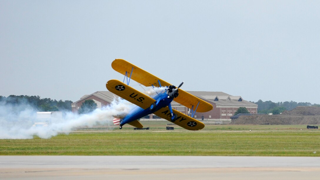 John Mohr, 1943 Stock Stearman PT-17 Pilot, performs low ground aerial maneuvers during the AirPower over Hampton Road Open House at Langley Air Force Base, Va., May 14, 2011. The open house helps to educate the public on past and present Air Force aerial capabilities, increase recruiting and show appreciation to the local community. (U.S. Air Force photo by Staff Sgt. Dana Hill)(RELEASED)