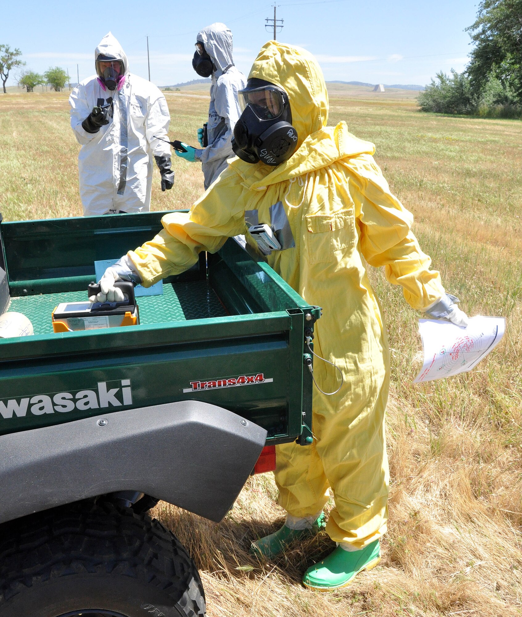 Air Force Reservist Tech. Sgt. Stephanie Chan, 940th Civil Engineer Squadron, scans a suspicious object with a Geiger counter during a Total Force Integration training exercise near the Beale Air Force Base CE compound, May 14. The exercise helped prepare both reserve and active duty airmen for any contingency involving radioactive explosive devices. (U.S. Air Force Photo/ Tech. Sgt. Luke Johnson)