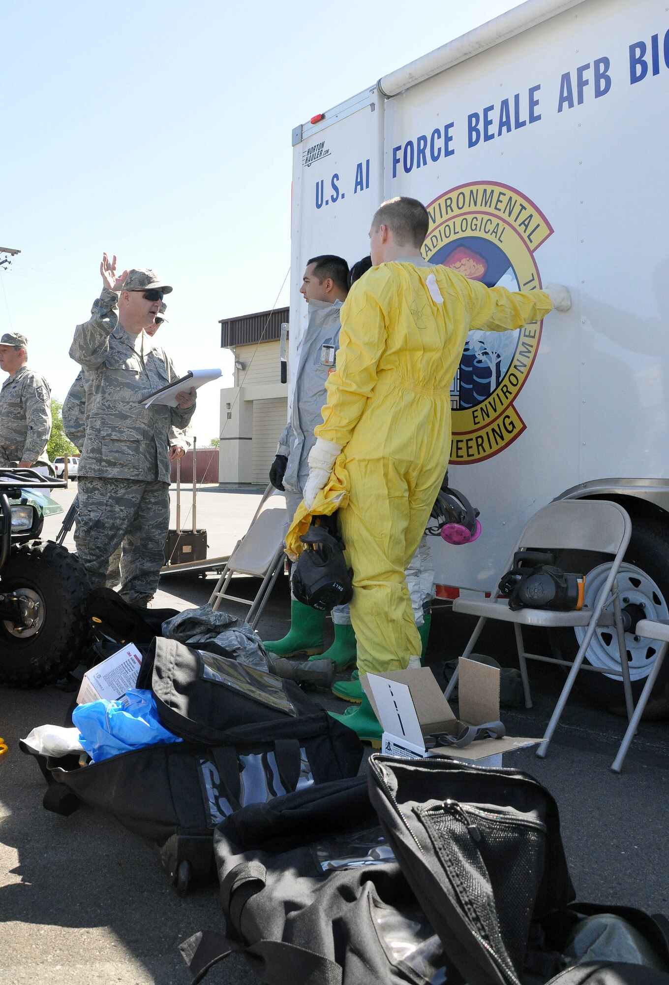 Air Force Reservist Master Sgt. Christopher Reitz, 940th Civil Engineer Squadron, provides a safety briefing to Airmen during a training exercise at the Beale Air Force Base CE compound, May 14. The exercise helped reserve and active duty units better prepare for any emergency involving a nuclear, biological or industrial disaster.  (U.S. Air Force Photo/ Tech. Sgt. Luke Johnson)
