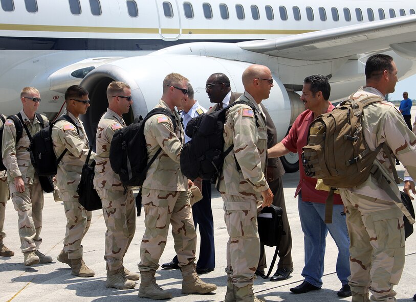 Members of the U.S. Coast Guard Maritime Safety and Security Team Miami are welcomed home at  Homestead ARB, Fla., after completing a 180-day mission at Guantanamo Bay, Cuba on May 13, 2011. 
