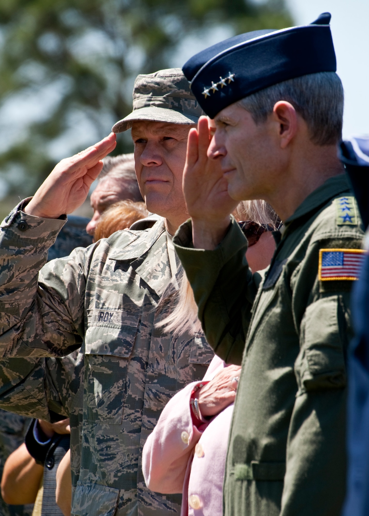 Air Force Chief of Staff Gen. Norton Schwartz and Chief Master Sgt. of the
Air Force James A. Roy salute the colors during the national anthem at an
MC-130E Combat Talon dedication ceremony at Hurlburt Field, Fla., May 6, 2011.  Chief Roy and General Schwartz, a former wing commander and Talon pilot at Hurlburt Field, saw the aircraft honored in its final resting place -- the base's airpark.  The Talon, known as "Wild Thing" around the 919th Special Operations Wing, made its final flight May 7, 2010, completing 21,336.5 hours of flight. (U.S. Air Force photo/Tech. Sgt. Samuel King Jr.)
