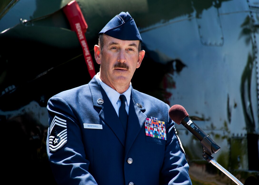 Chief Master Sgt. Dale Berryhill, 711th Special Operations Squadron, talks to the crowd about the history behind the “Wild Thing” – the MC-130E Combat Talon 64-567 during its dedication ceremony at Hurlburt Field May 6.  The Talon known as “Wild Thing” had a 46-year Air Force career and 22,336.5 flight hours.  (U.S. Air Force photo/Tech. Sgt. Samuel King Jr.)