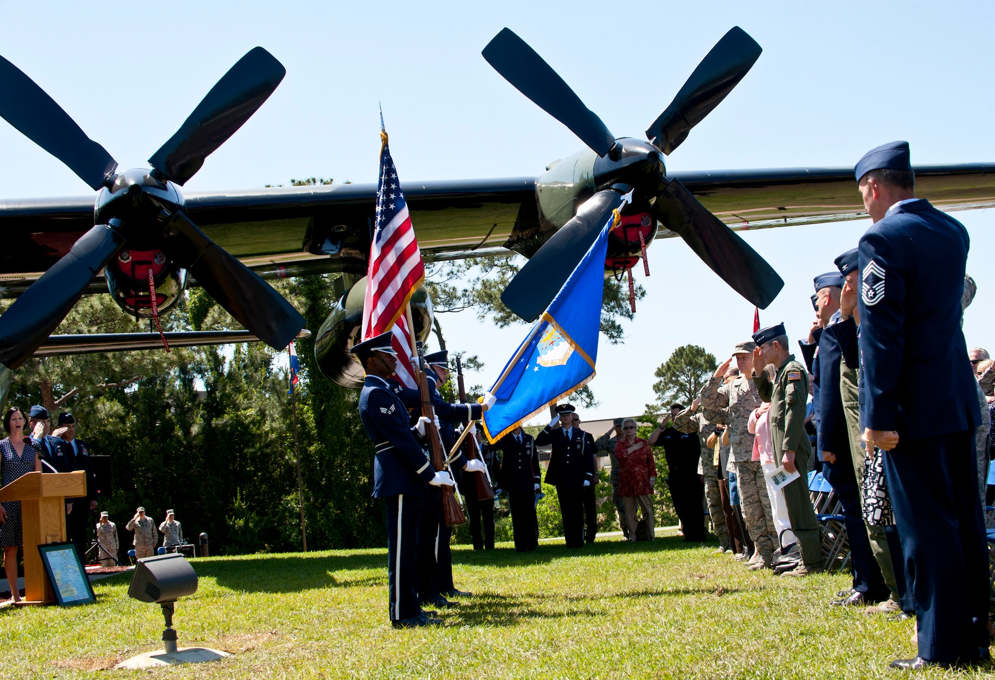 Hurlburt Field Honor Guard Airmen present the colors in the shadow of Combat Talon 64-567 during its dedication ceremony at the Hurlburt Field airpark May 6.  The Talon known as “Wild Thing” had a 46-year Air Force career and 22,336.5 flight hours.  (U.S. Air Force photo/Tech. Sgt. Samuel King Jr.)